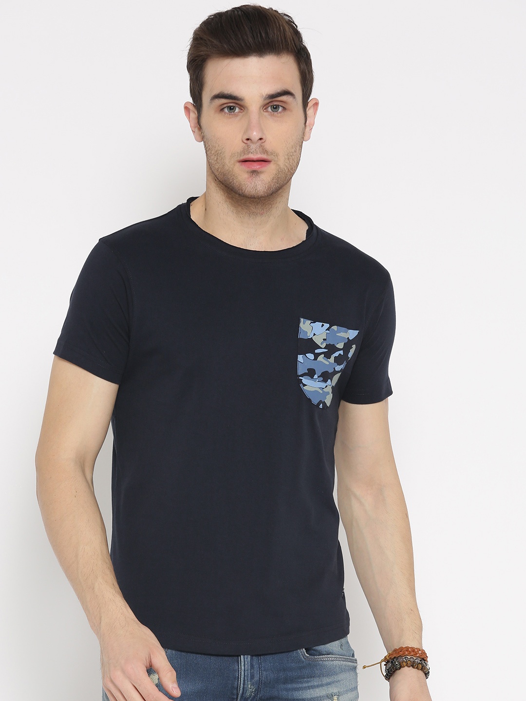 

Roadster Men Navy Blue Solid Round Neck T-shirt