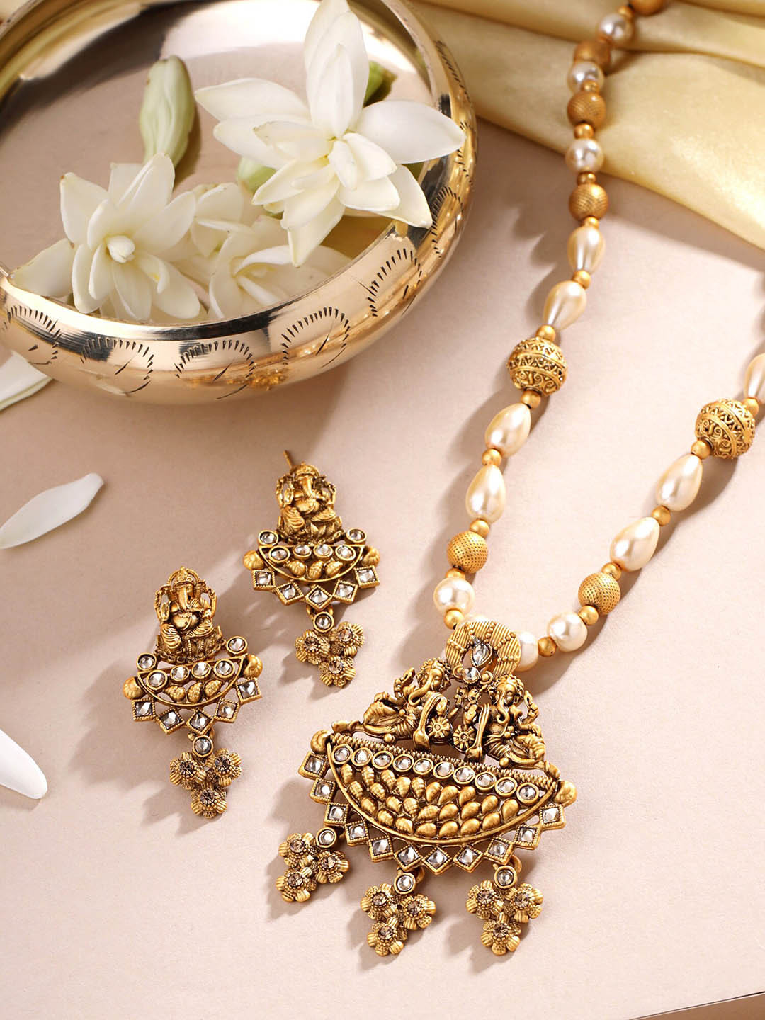 

Yellow Chimes Gold-Plated Pearl Beaded Lord Ganeshji Designed Long Jewellery Set, White
