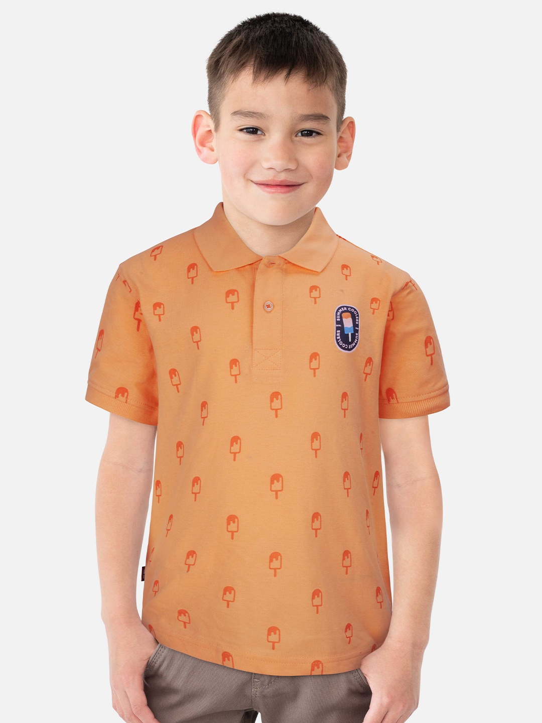 

Gini and Jony Boys Conversational Printed Polo Collar Cotton T-shirt, Peach