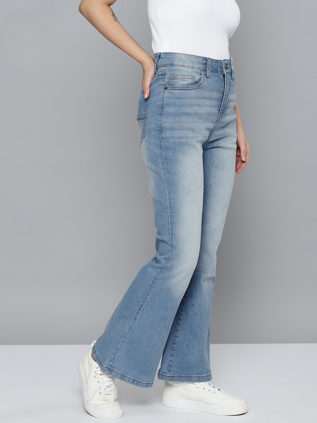 

Mast & Harbour Women Super Flared Heavy Fade Stretchable Jeans, Blue