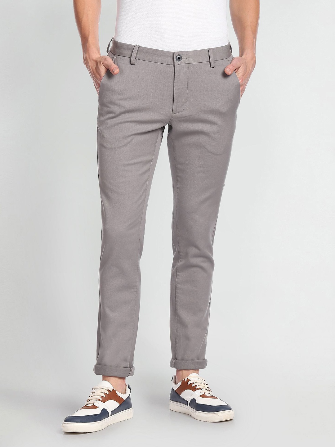 

Arrow Sport Men Solid Slim Fit Low-Rise Plain Woven Flat-Front Regular Trousers, Grey