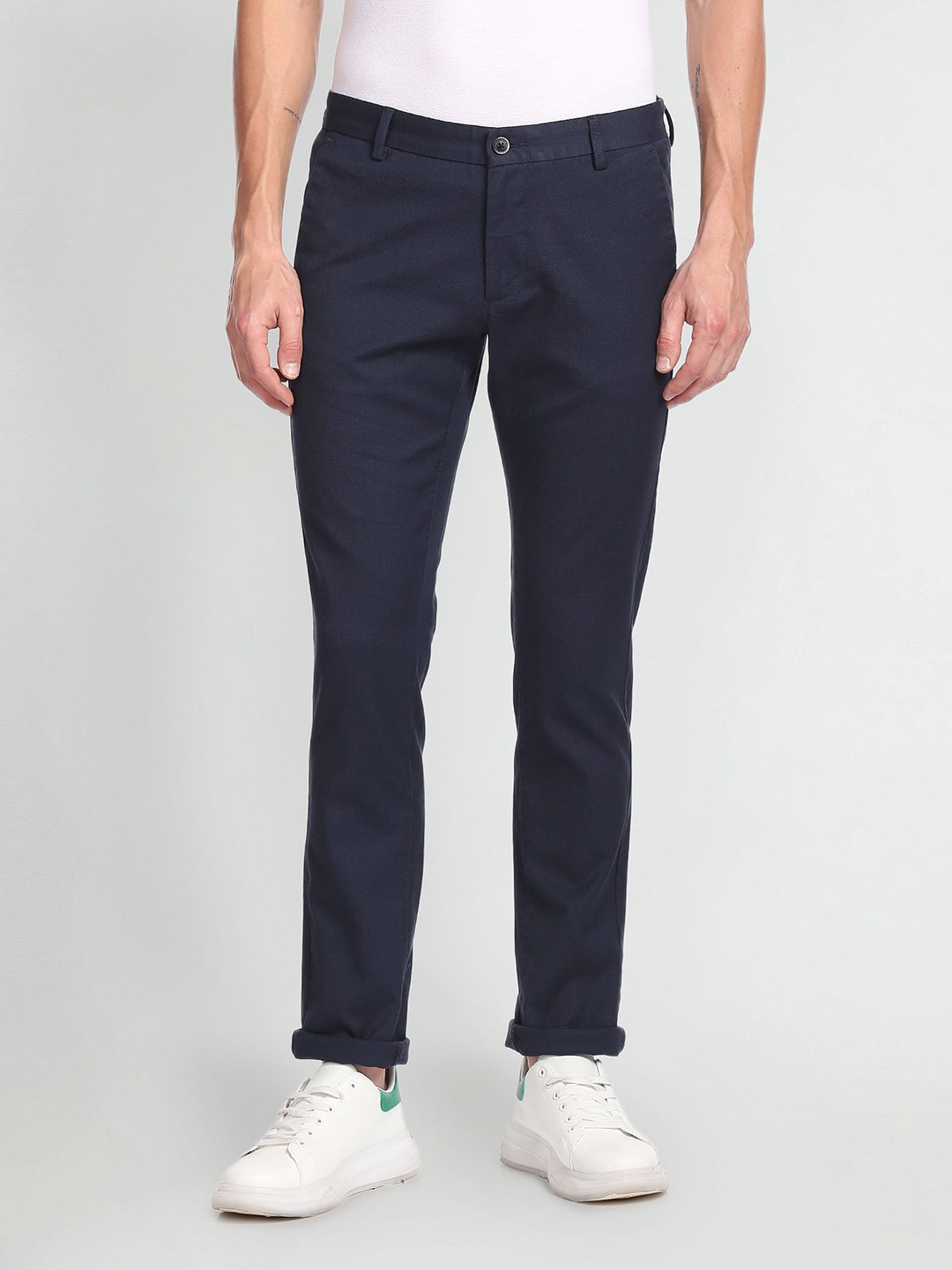 

Arrow Sport Men Self Design Textured Original Slim Fit Chinos, Navy blue