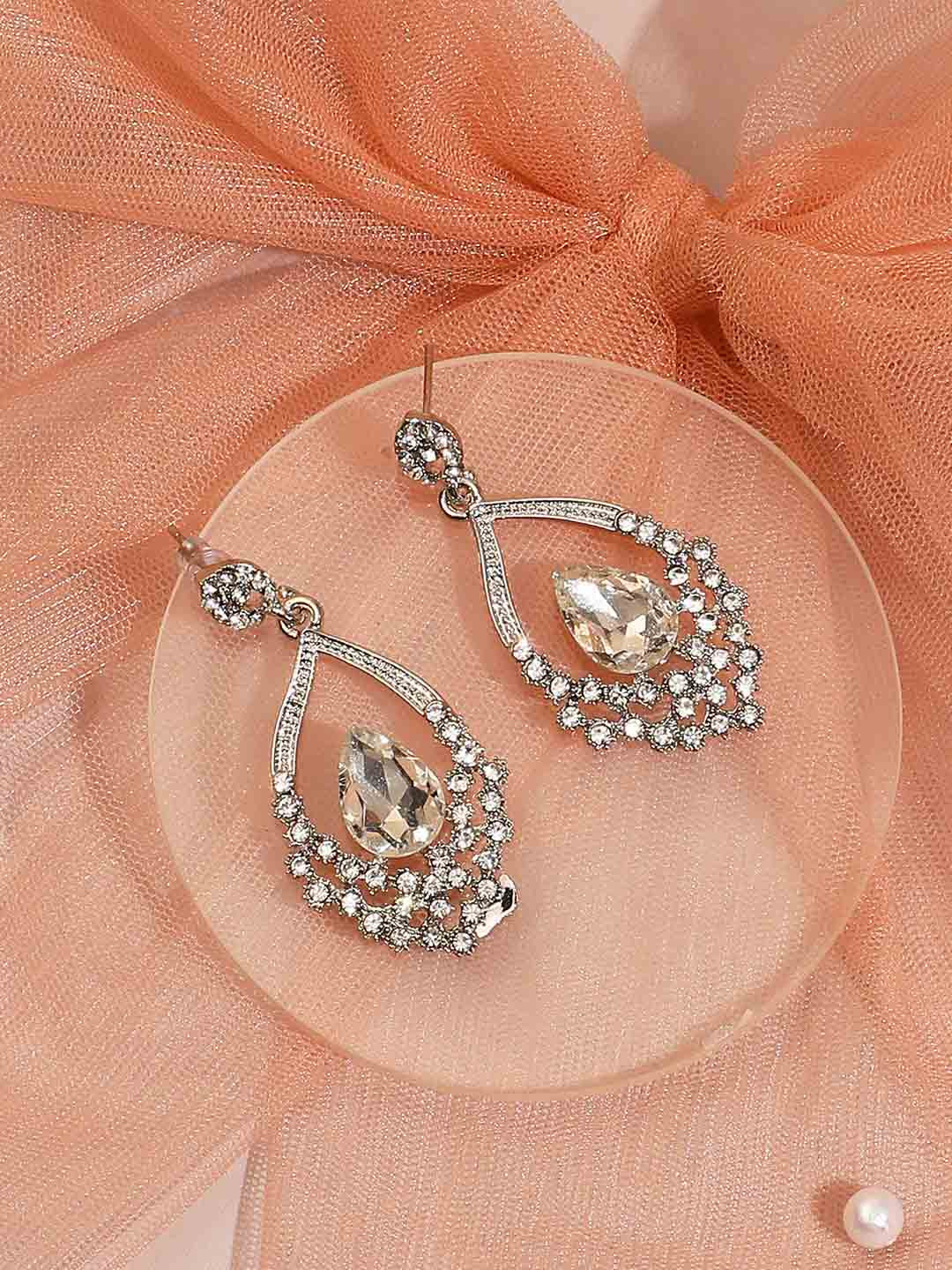 

SOHI Silver-Plated Contemporary Drop Earrings