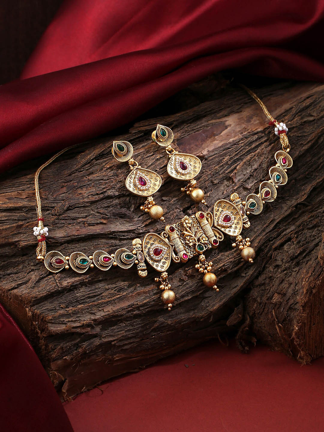 

Yellow Chimes Gold-Plated Floral Stone-Studded Jewellery Set