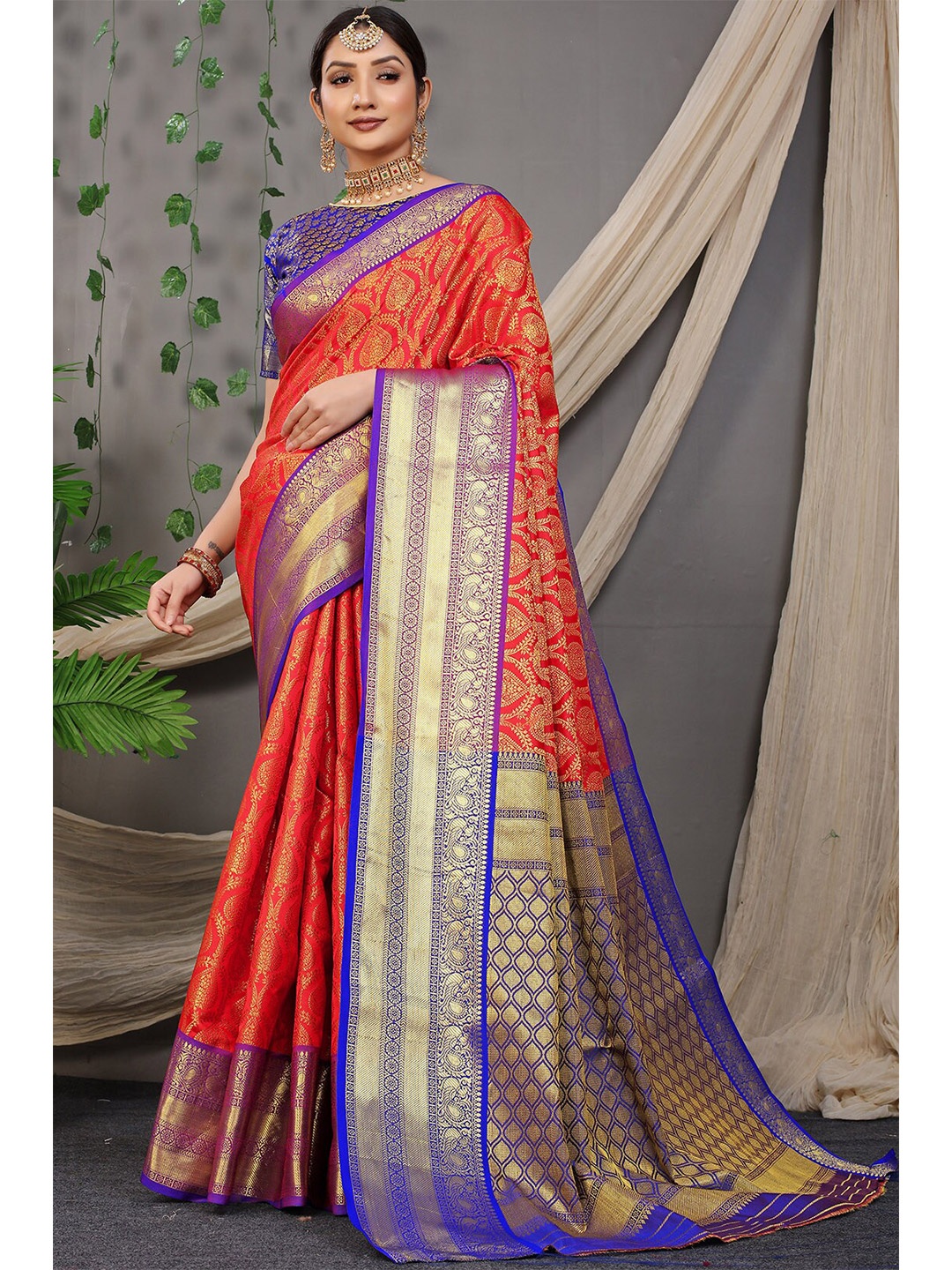 

MARGI DESIGNERS Red & Blue Woven Design Zari Art Silk Banarasi Saree