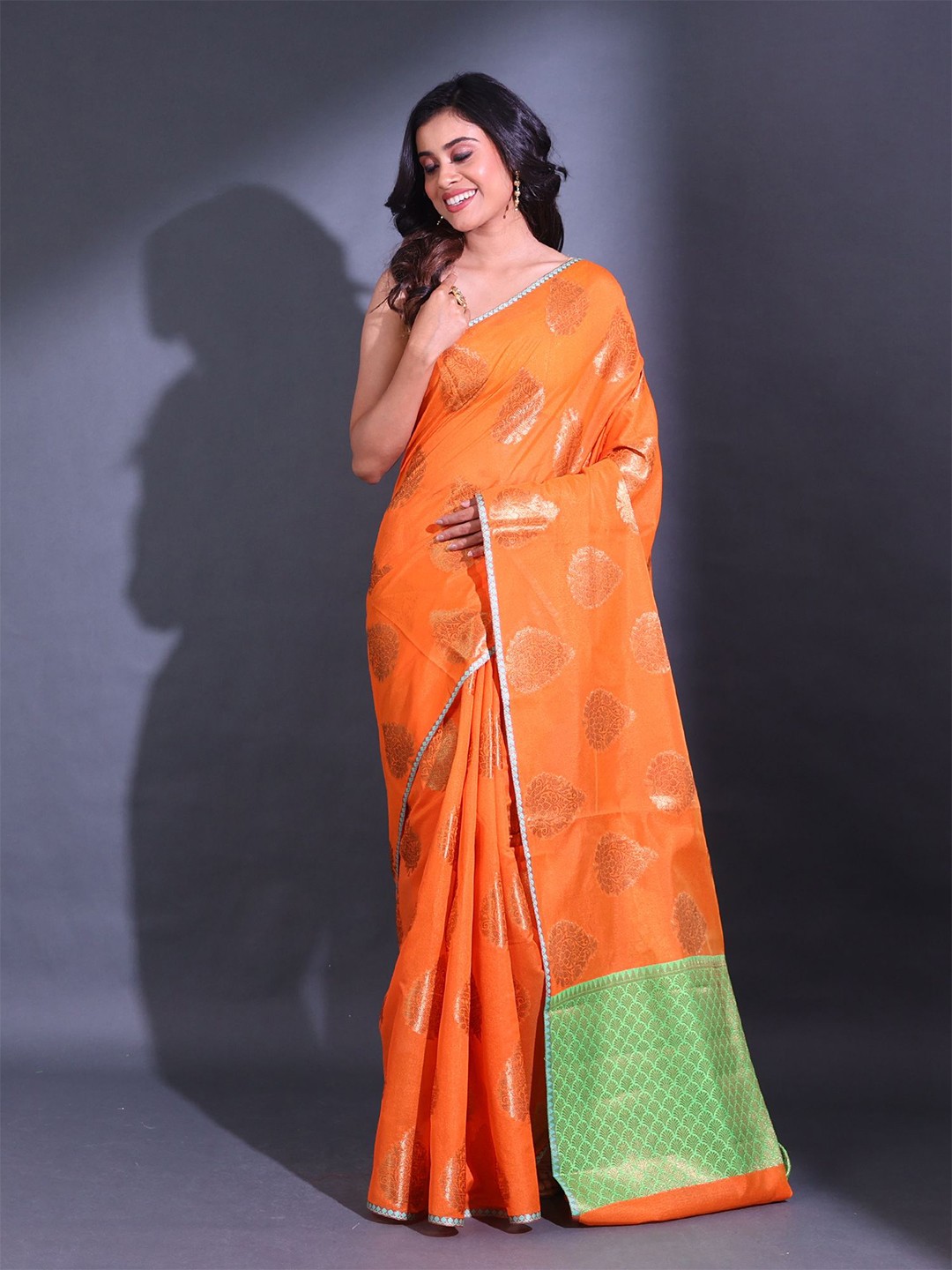 

Charukriti Ethnic Woven Design Zari Saree, Orange