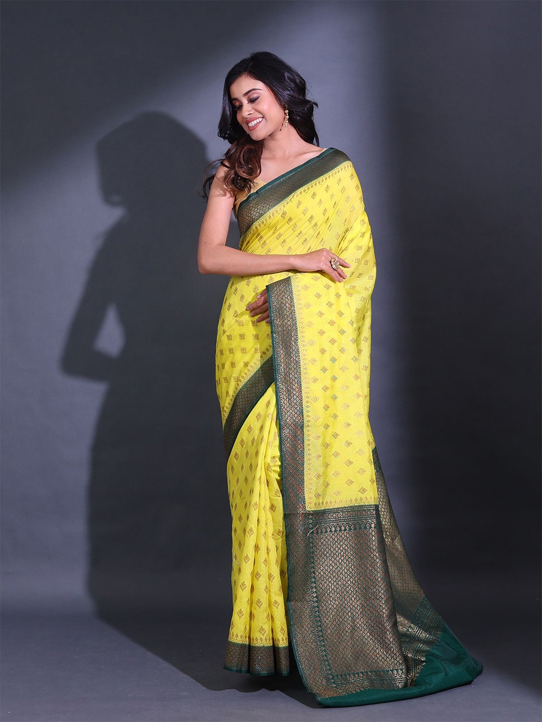 

Charukriti Etnic Motif Woven Design Zari Saree, Yellow
