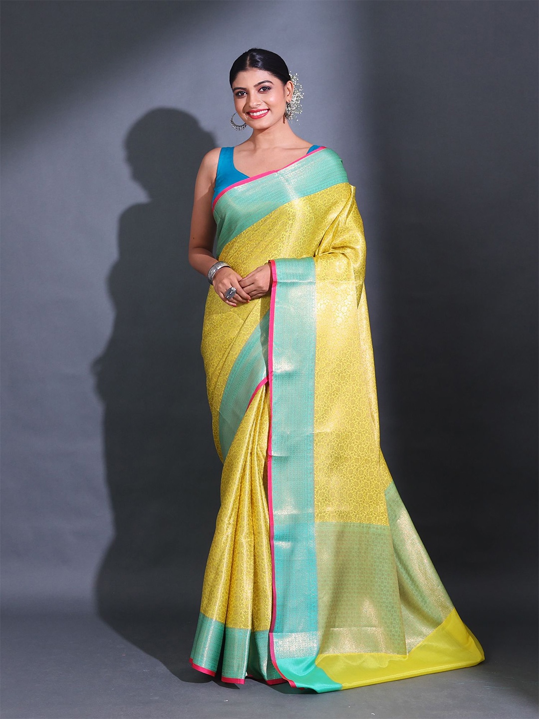 

Charukriti Ethnic Motifs Woven Design Zari Silk Blend Saree, Yellow