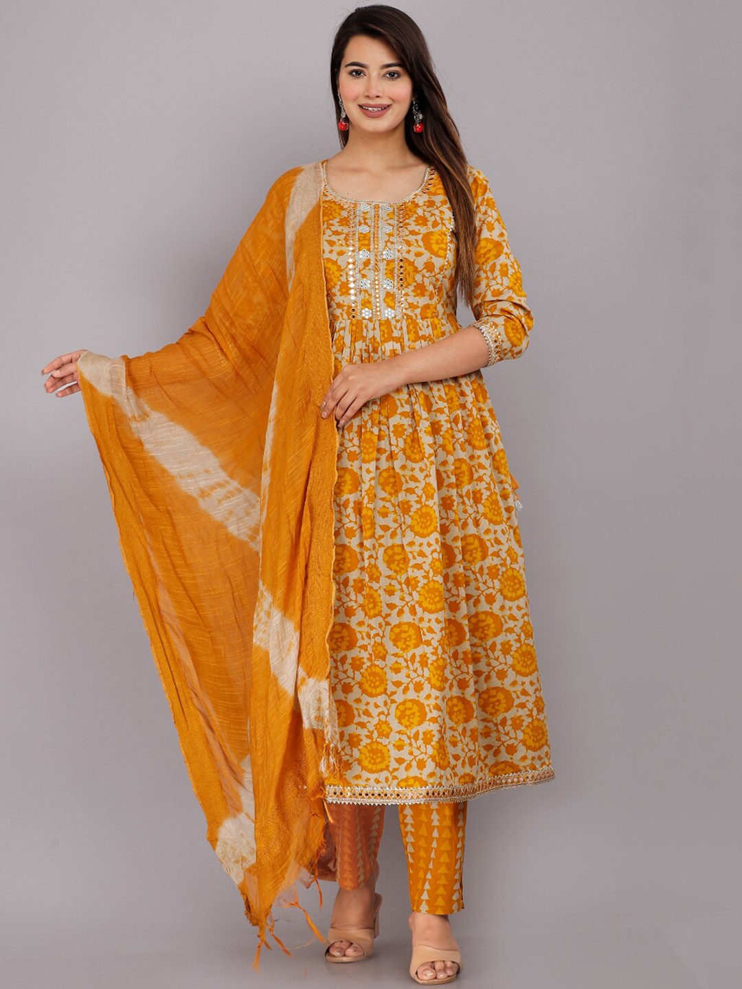 

HIGHLIGHT FASHION EXPORT Women Mustard Yellow Floral Printed Pleated Pure Cotton Kurta with Trousers & With