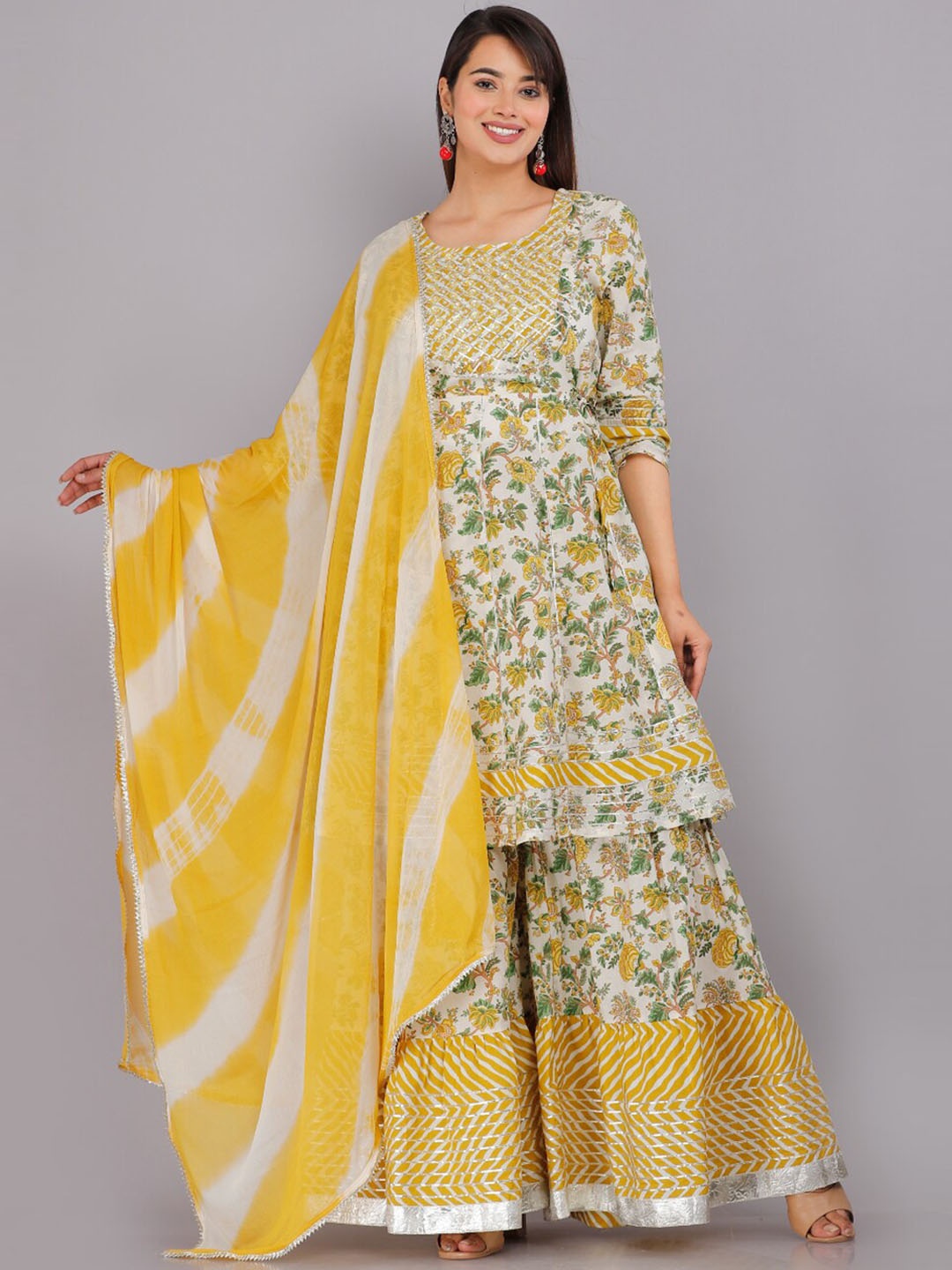 

HIGHLIGHT FASHION EXPORT Women Yellow Floral Printed Empire Sequinned Pure Cotton Kurta with Sharara & With