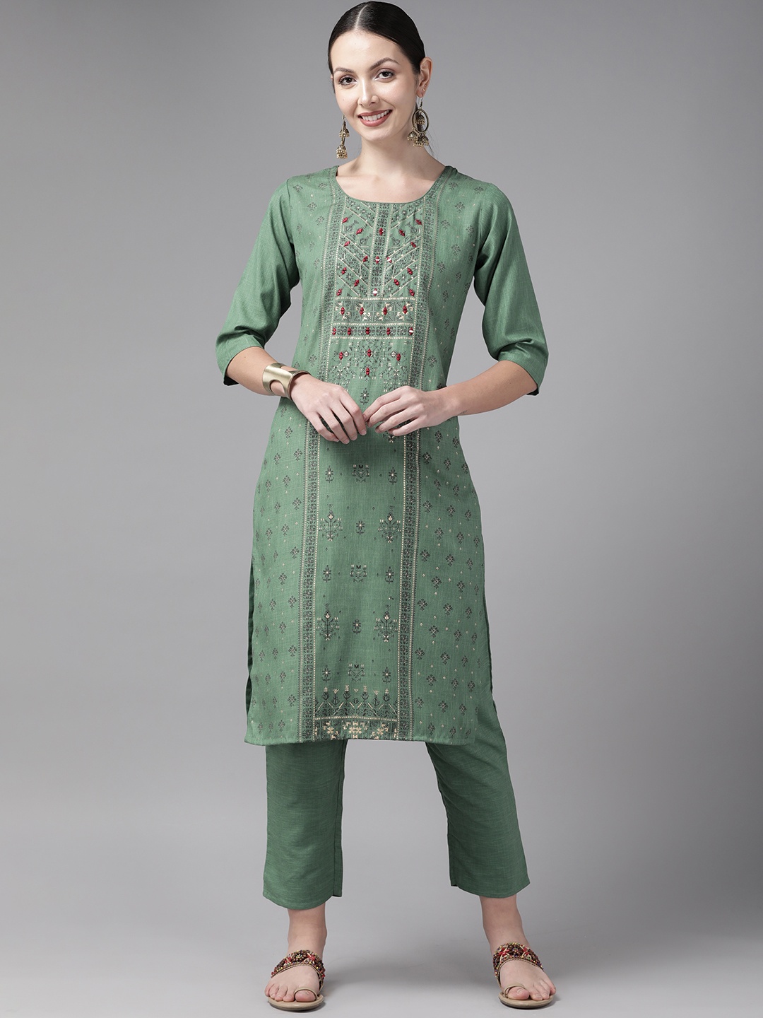 

Aarika Women Green Floral Embroidered Pure Cotton Kurta with Trousers