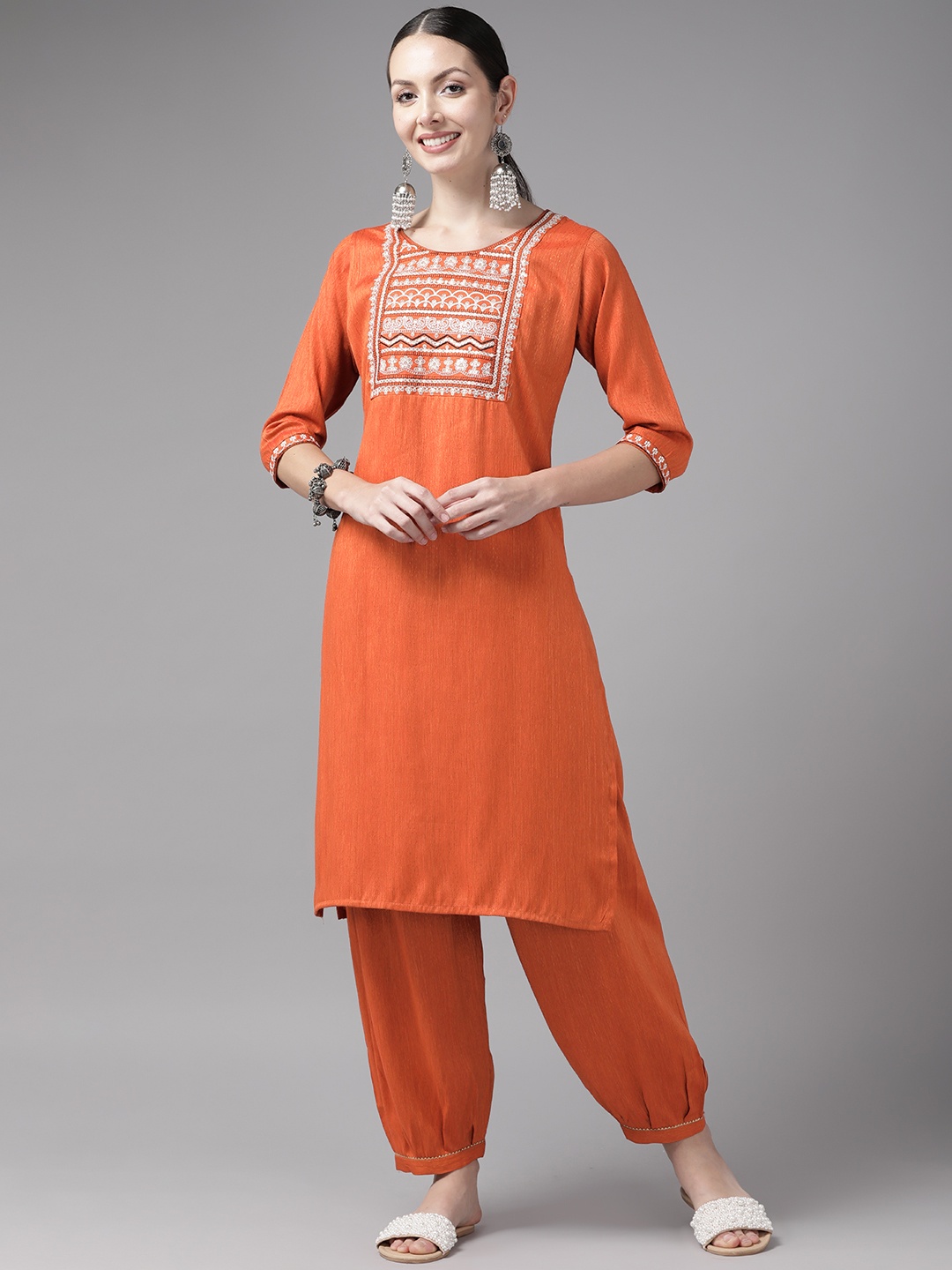 

Aarika Women Orange Embroidered Pure Cotton Kurta with Trousers