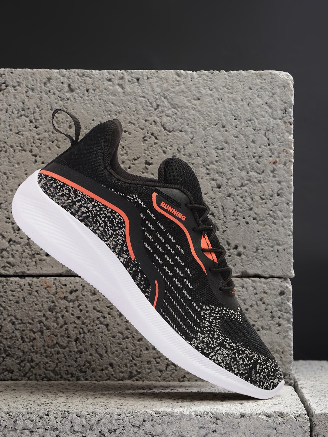 

Roadster Men Self-Design Flyknit Technology Running Sports Shoes, Black