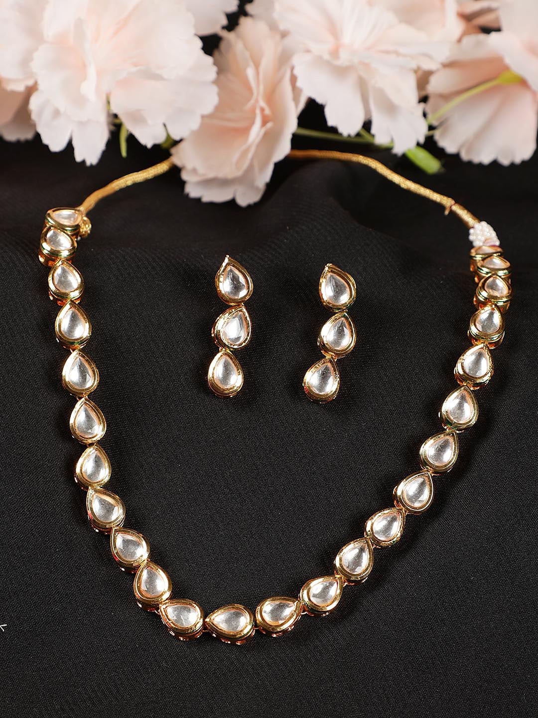 

Jazz and Sizzle Gold-Plated Kundan Studded Choker Necklace and Earrings, White