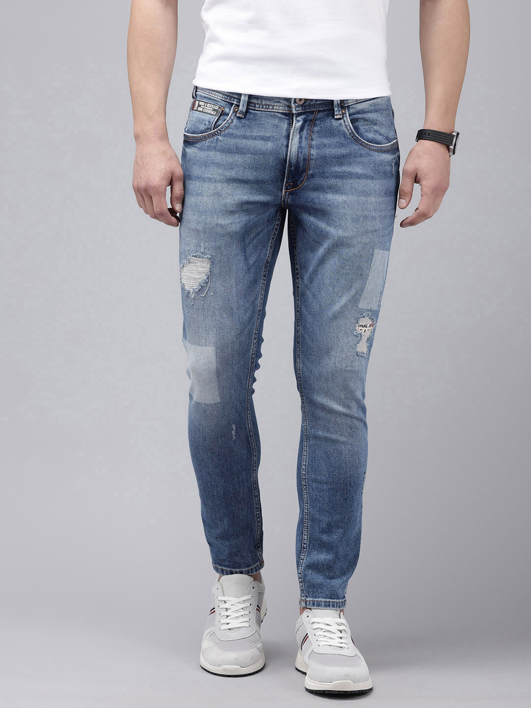 

SPYKAR Men Kano Tapered Fit Mildly Distressed Heavy Fade Stretchable Jeans, Blue