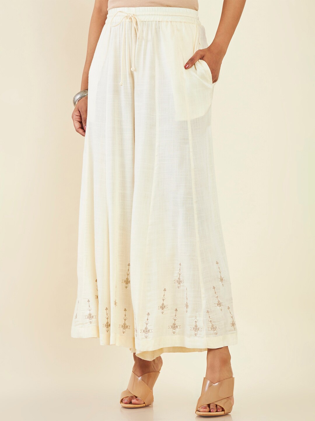

Soch Women Embroidered Flared Knitted Palazzos, Off white