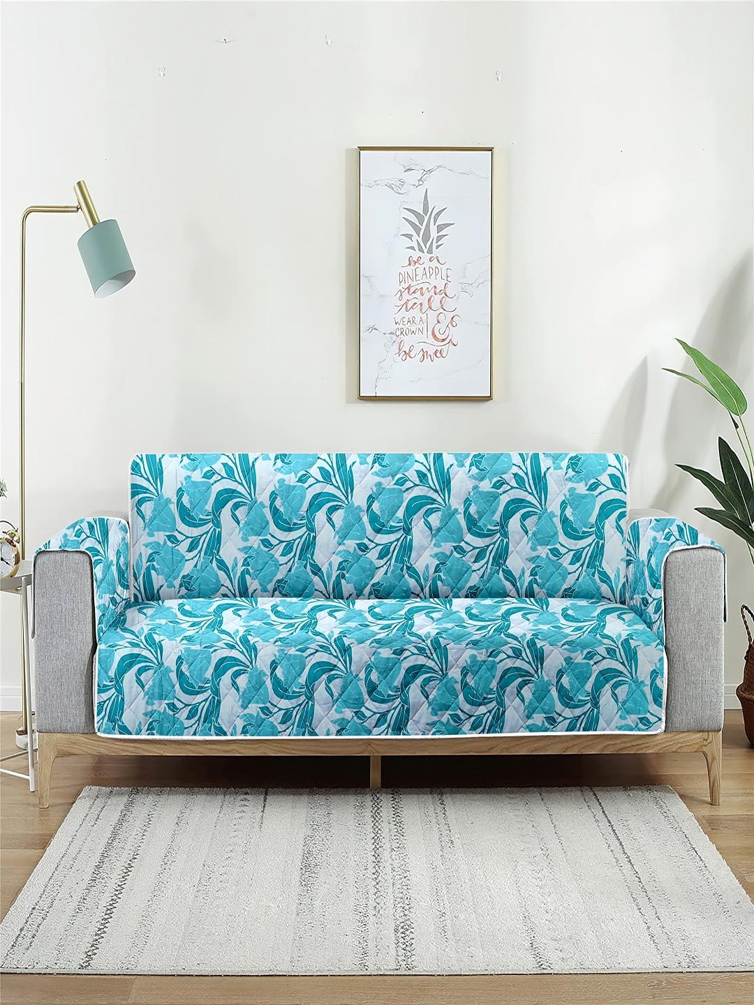 

Cortina Blue Floral Printed Reversible 2-Seater Sofa Cover With Arms