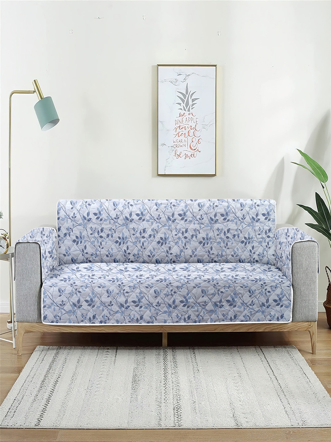 

Cortina Blue & White Printed 2-Seater Reversible Sofa Cover With Arms