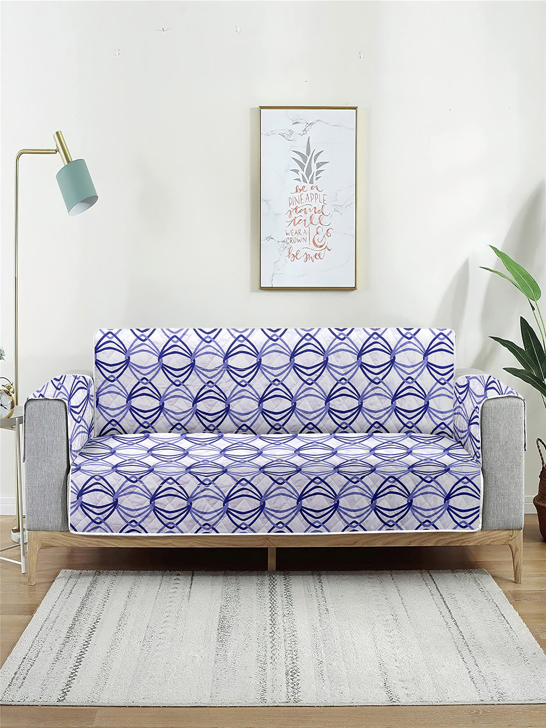 

Cortina White & Turquoise Blue Printed 2 Seater Reversible Sofa Cover With Arms