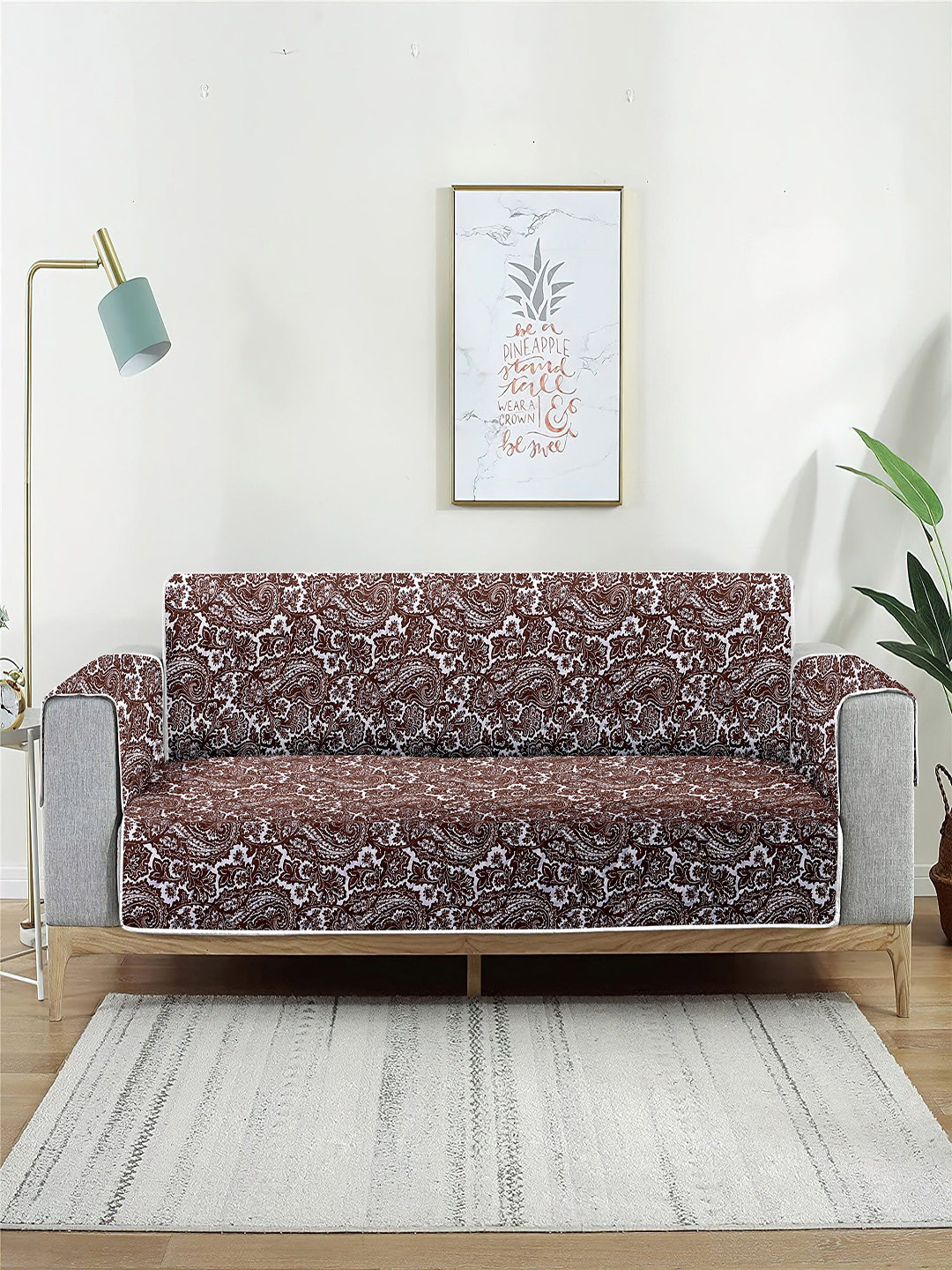 

Cortina Orange & Maroon Printed Two Seater Reversible Sofa Cover With Arms