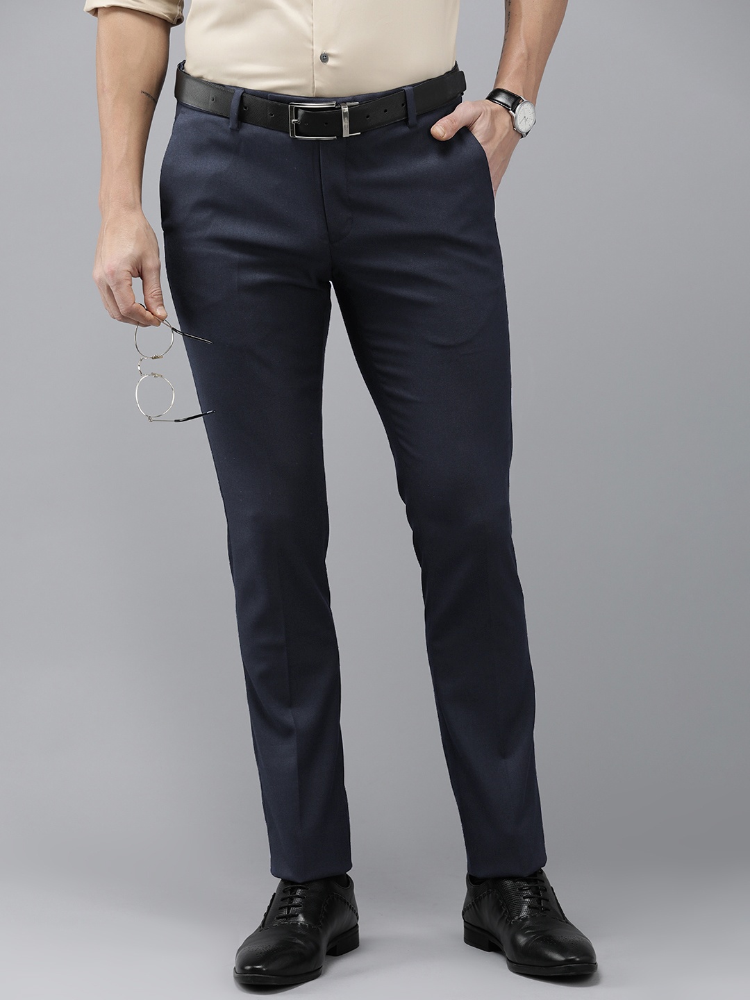 

Arrow Men Solid Tailored Fit Formal Trousers, Navy blue