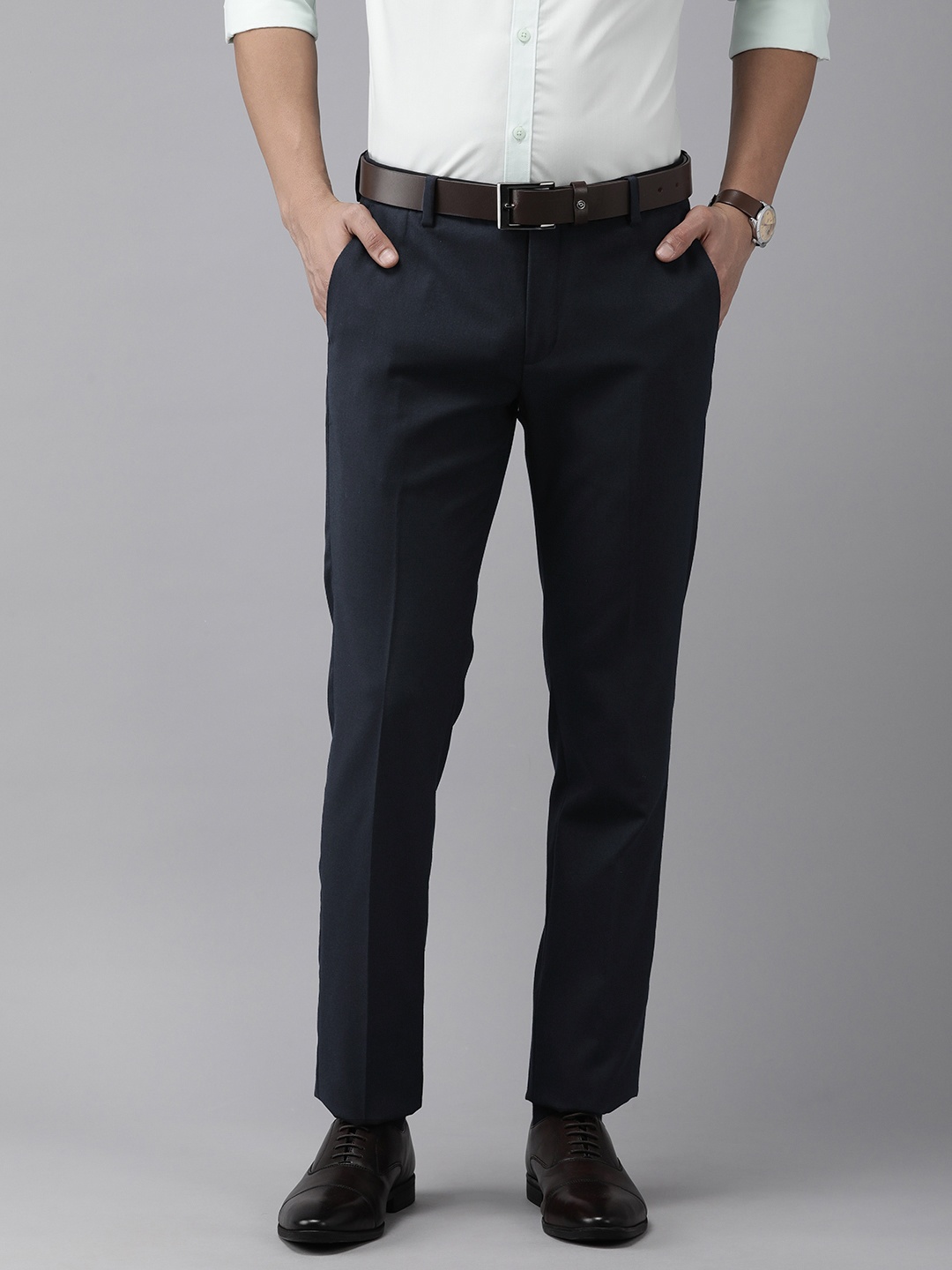 

Arrow Men Mid-Rise Tailored Fit Solid Trousers, Blue