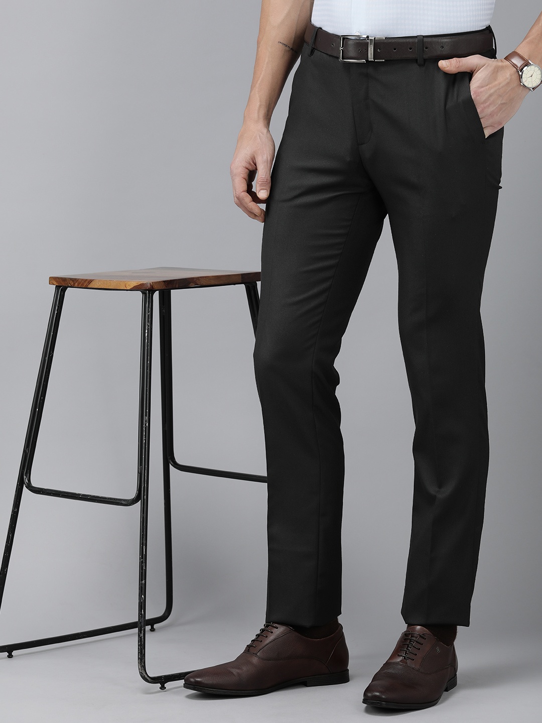 

Arrow Men Solid Tailored Fit Formal Trousers, Black