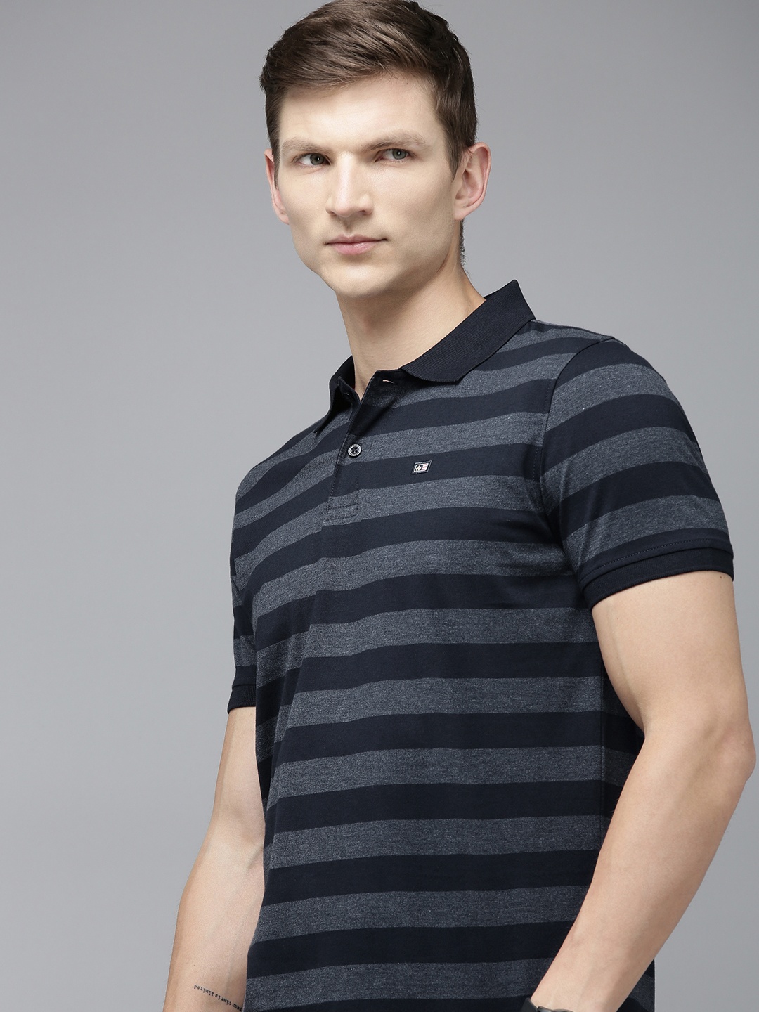 

Arrow Men Yarn Dyed Regular Fit Striped Polo Collar T-shirt, Navy blue