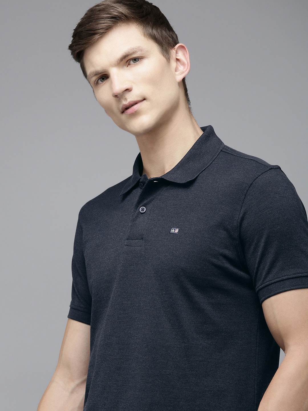 

Arrow Men Solid Short Sleeves Polo Collar T-shirt, Navy blue