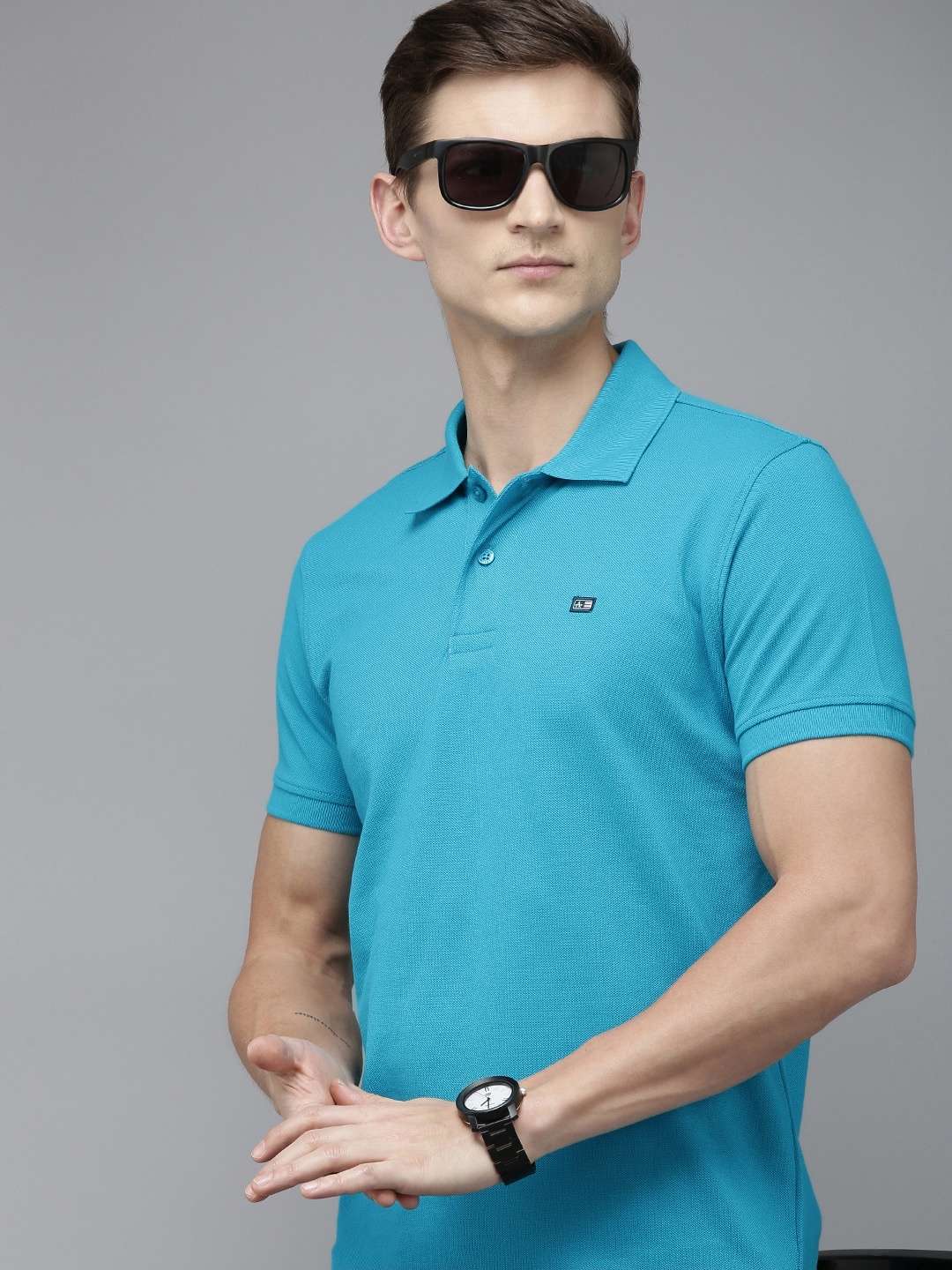 

Arrow Men Solid Short Sleeves Polo Collar T-shirt, Blue