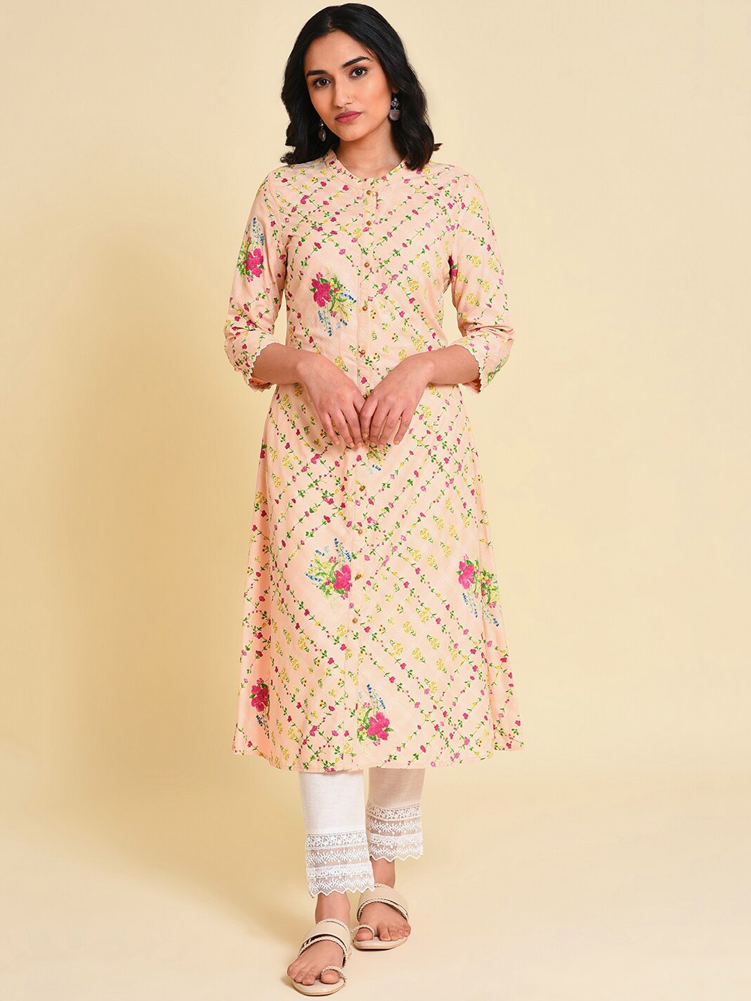 

W Women Floral Printed Thread Work A-Line Kurta with Trousers, Peach