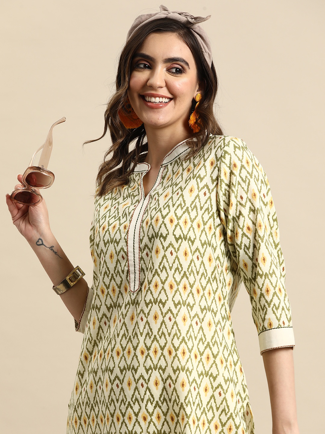 

Sangria Women Printed Regular Thread Work Pure Cotton Kurta With Trousers, Yellow