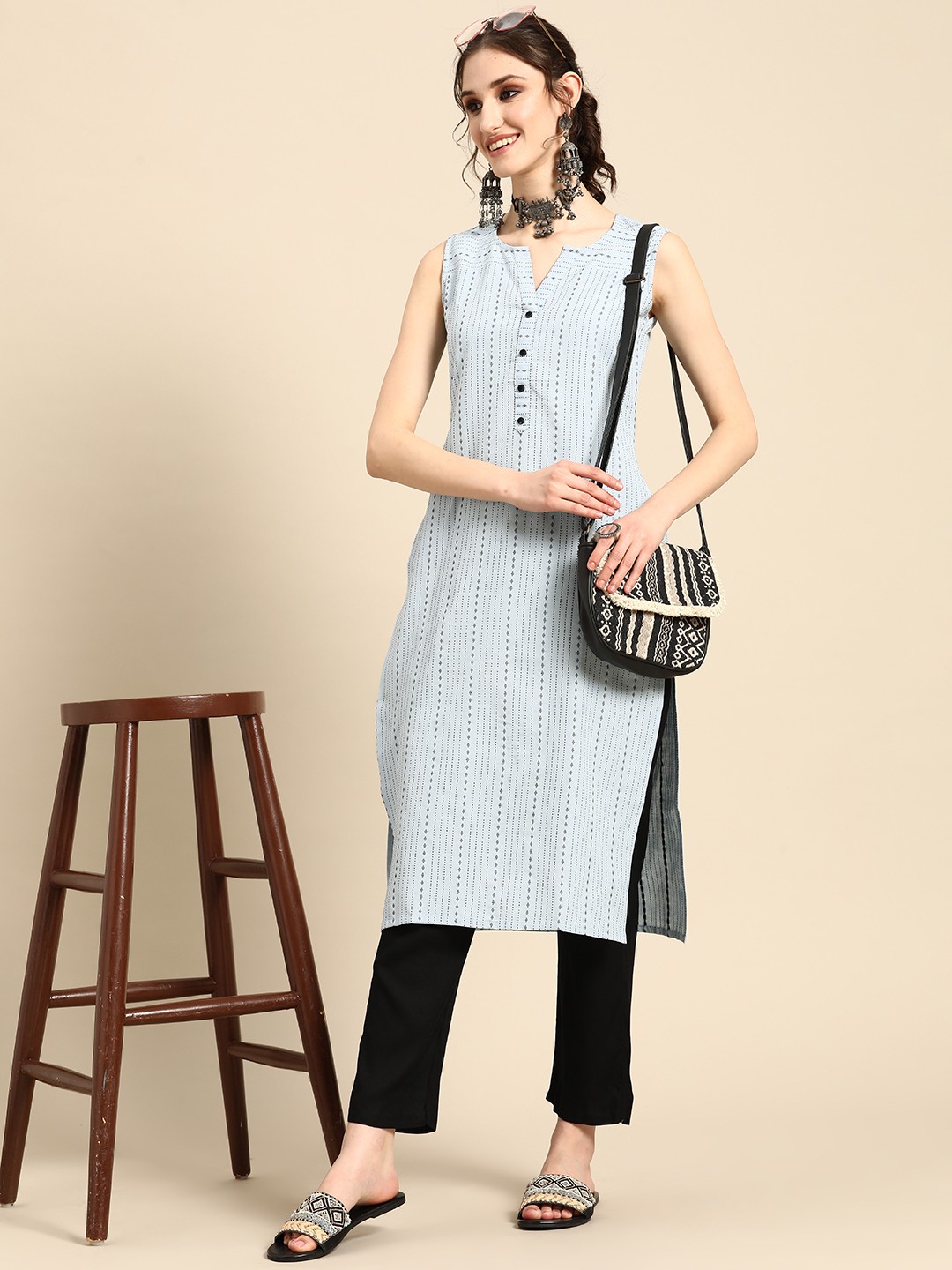 

Sangria Women Blue Striped Regular Kurta with Trousers
