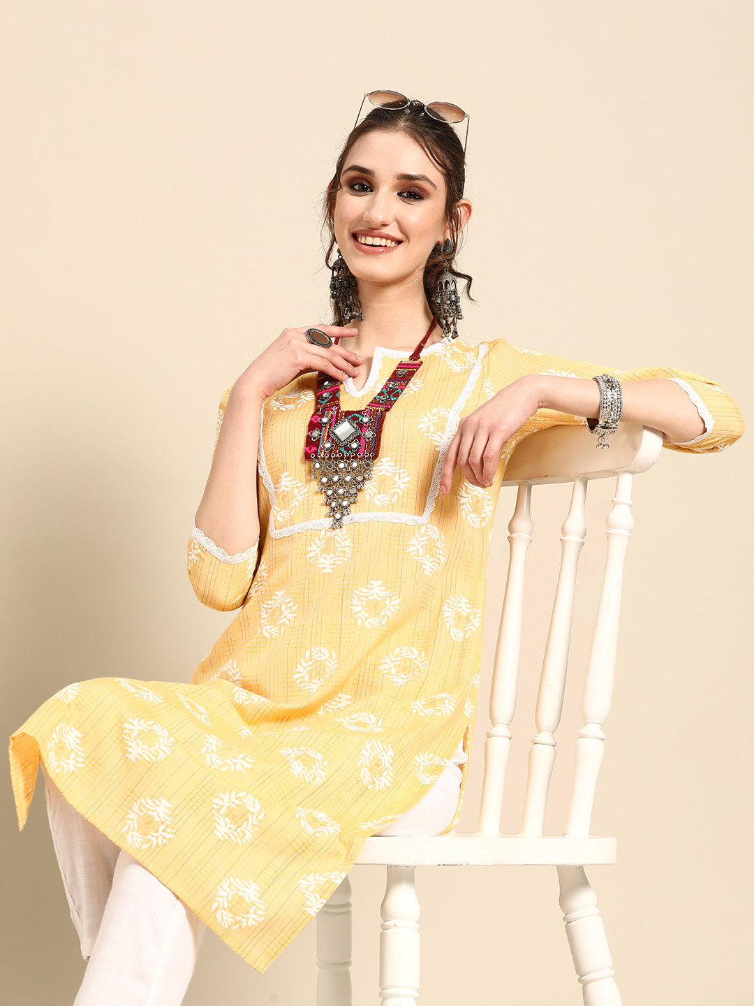 

Sangria Floral Printed Regular Kurta with Trousers, Yellow