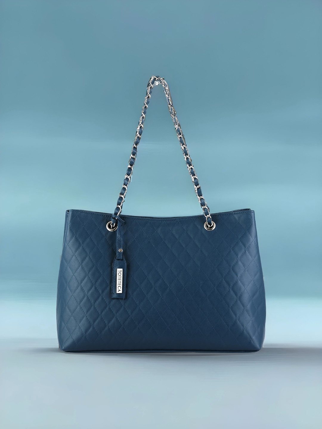 

Toteteca Textured Structured Handheld Bag With Tasselled, Blue