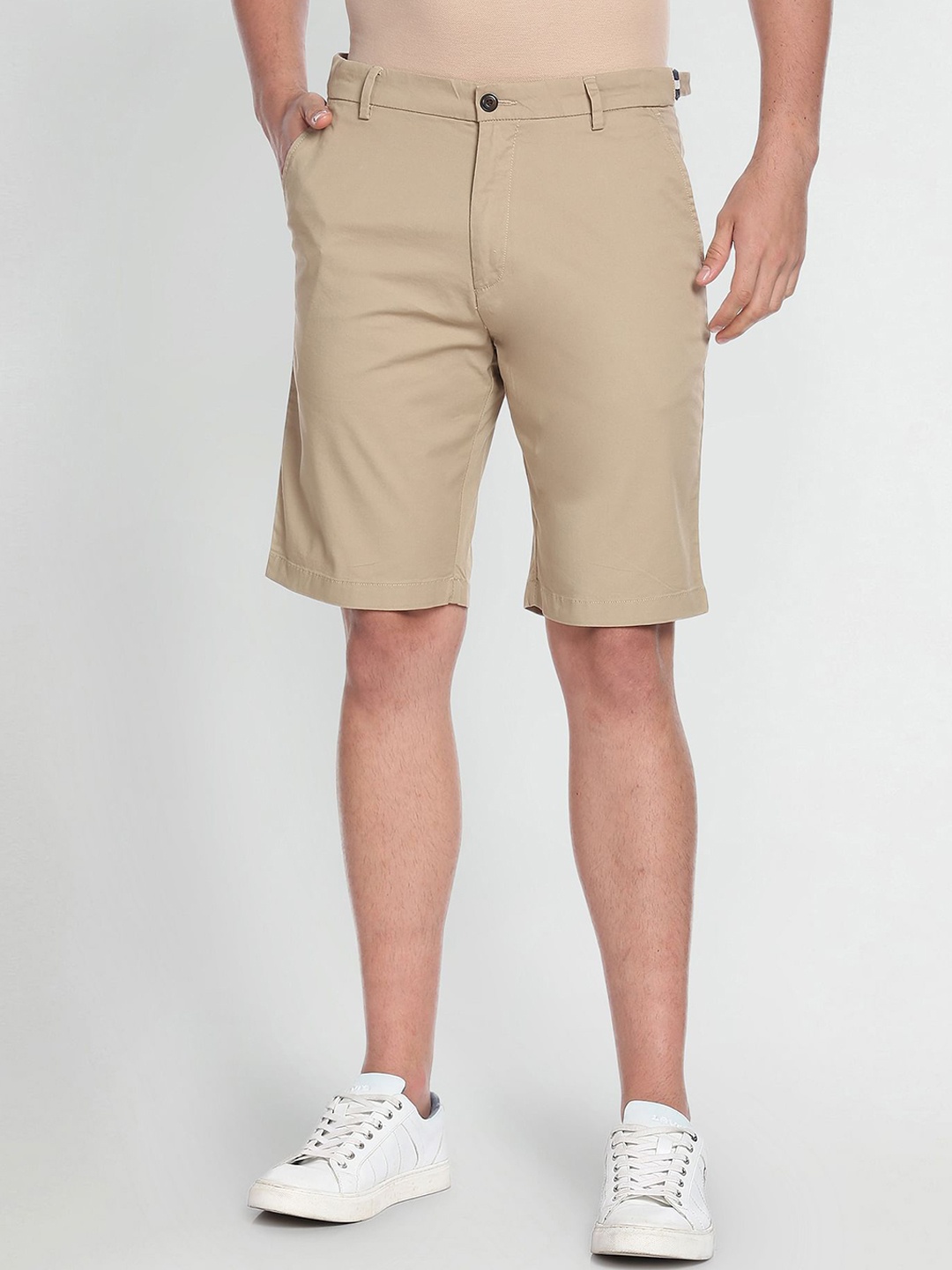

Arrow Sport Men Solid Mid-Rise Autoflex Shorts, Beige