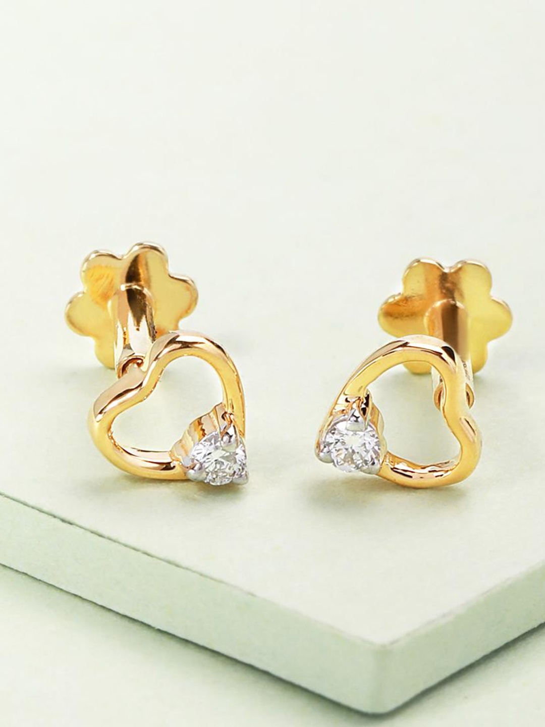 

CANDERE A KALYAN JEWELLERS COMPANY Diamond-Studded 18KT Gold Stud Earrings - 0.75 gm, Yellow