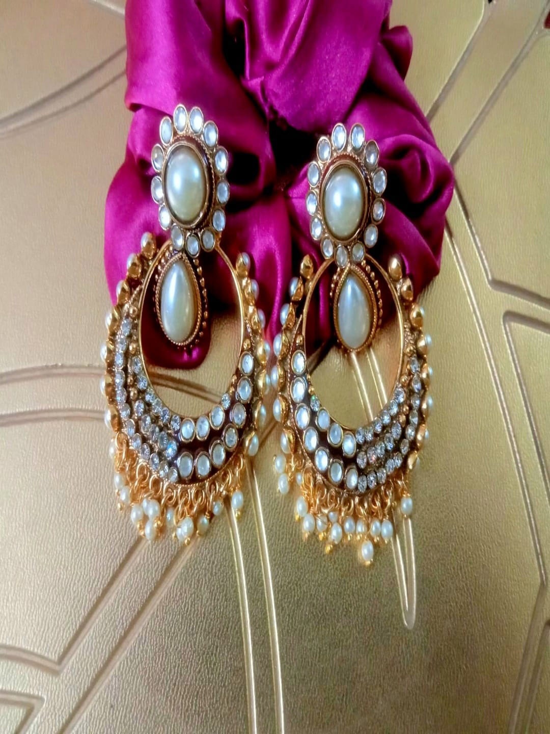 

Runjhun Gold-Plated Stone-Studded Crescent Shaped Chandbalis, White