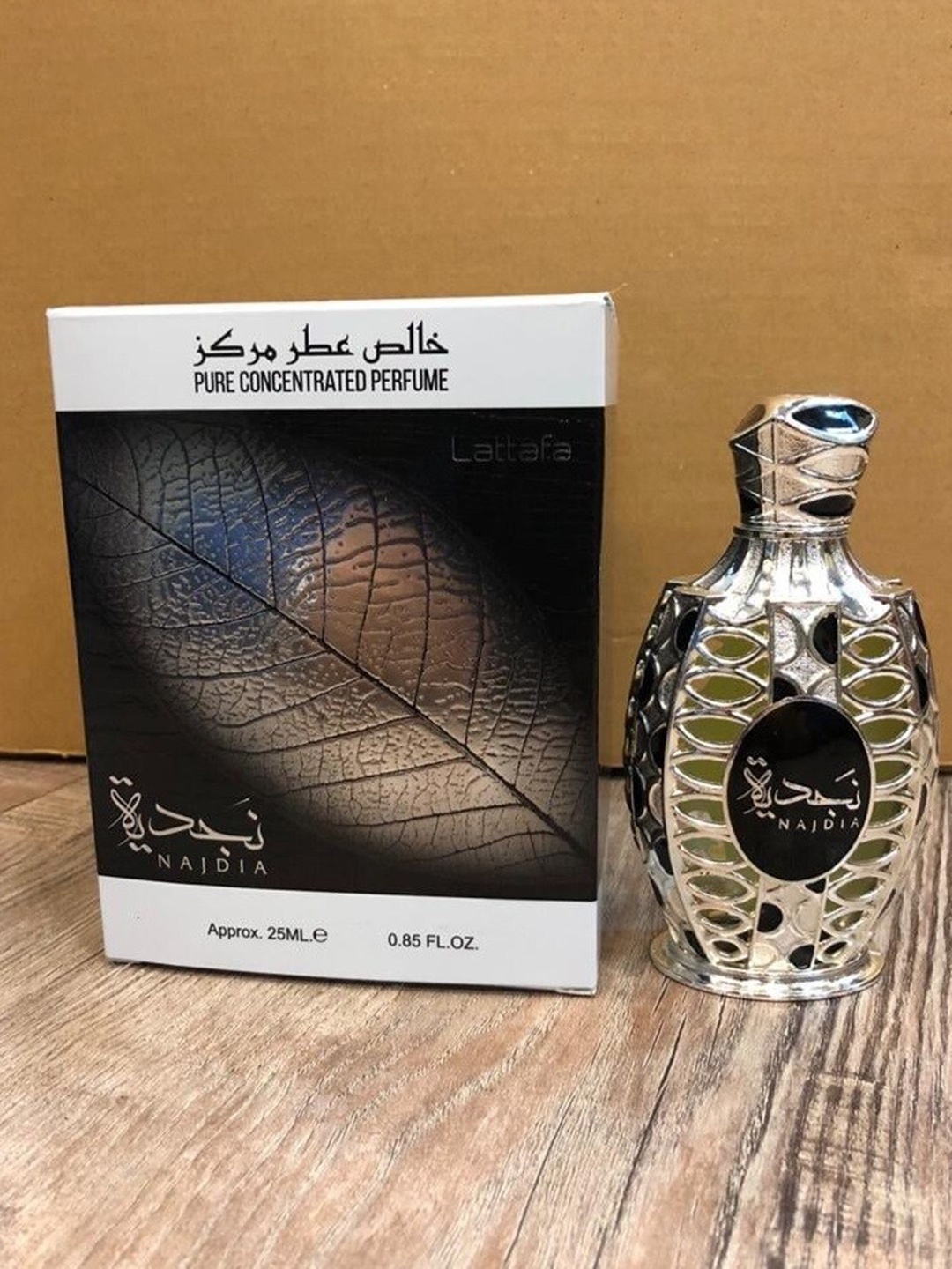 

Lattafa Najdia Pure Concentrated Perfume Attar - 25ml, Silver