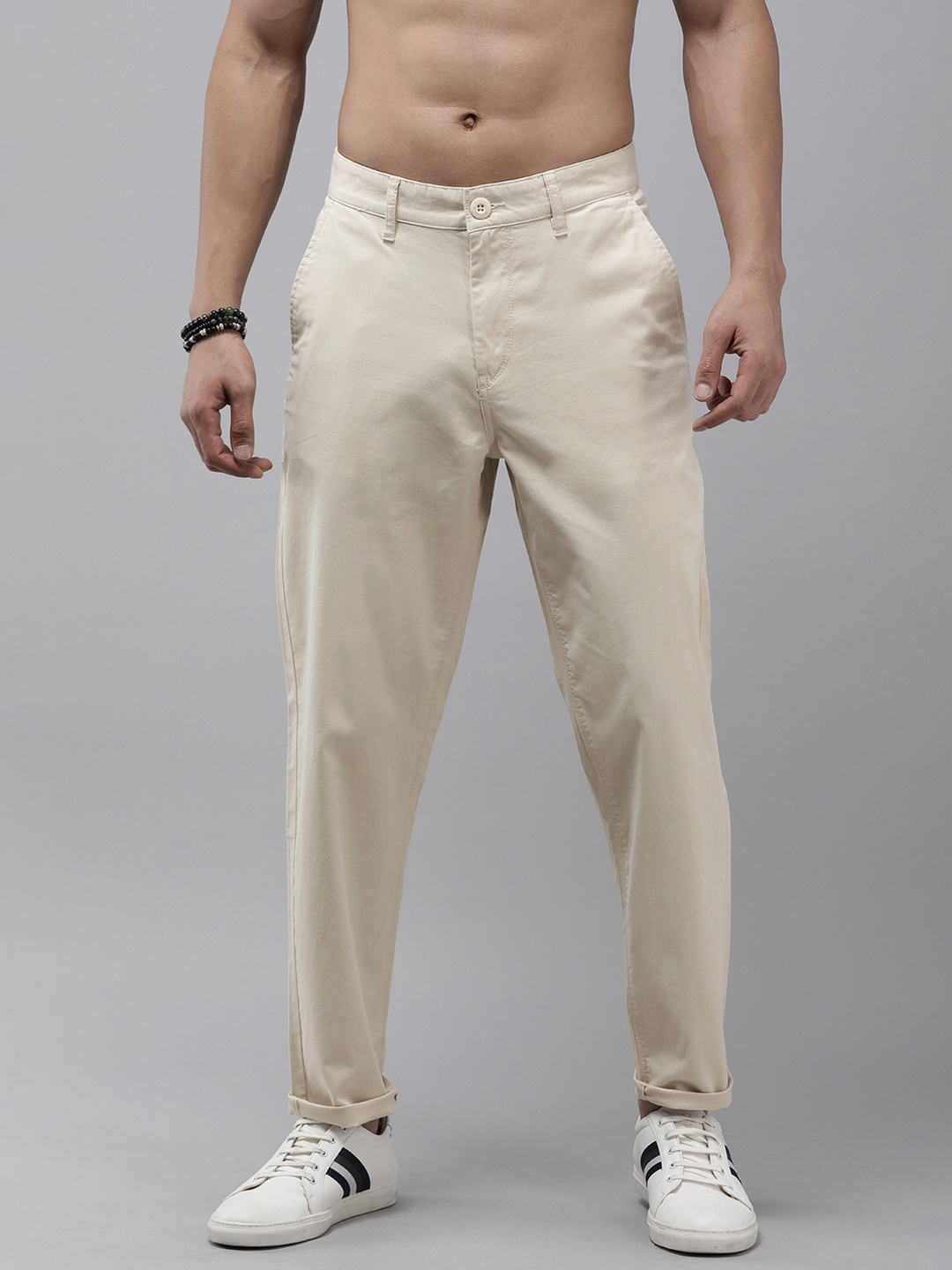 

The Roadster Lifestyle Co. Men Flat Front Loose Fit Chinos Trousers, Cream
