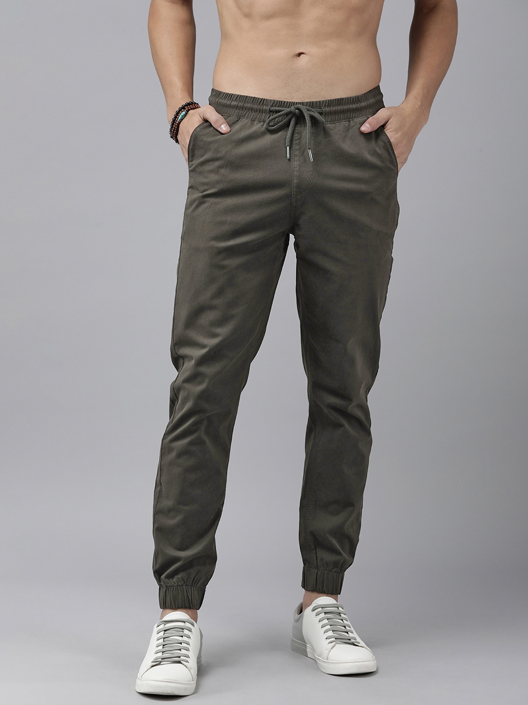 

The Roadster Lifestyle Co. Men Solid Pleated Mid-Rise Joggers, Olive