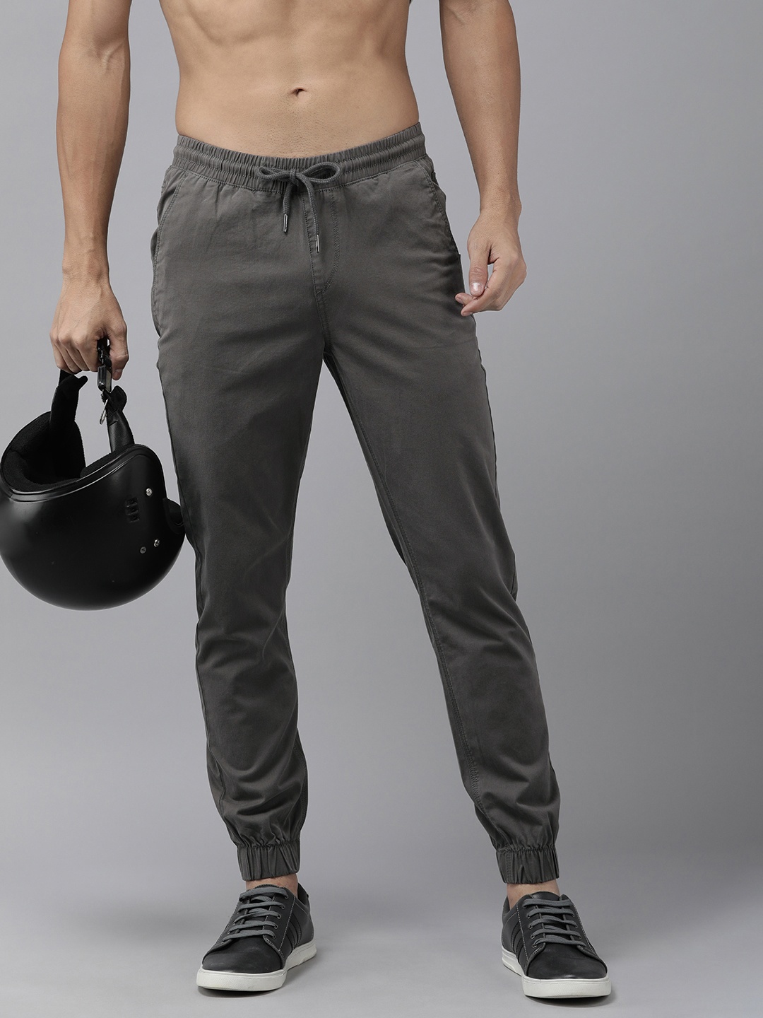 

The Roadster Lifestyle Co. Men Solid Pleated Mid-Rise Joggers, Grey