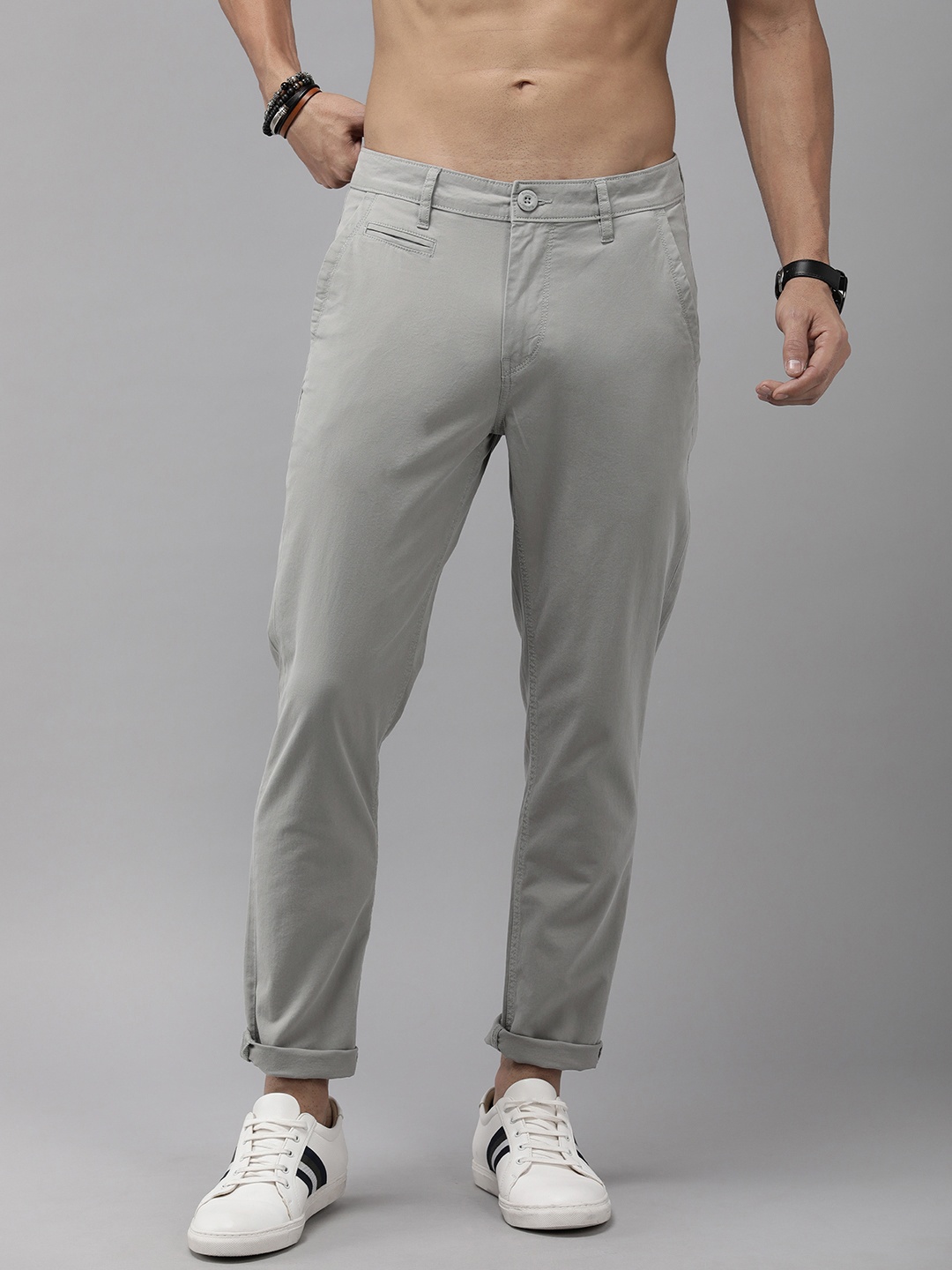 

The Roadster Lifestyle Co. Men Flat Front Mid Rise Tapered Fit Trousers, Grey