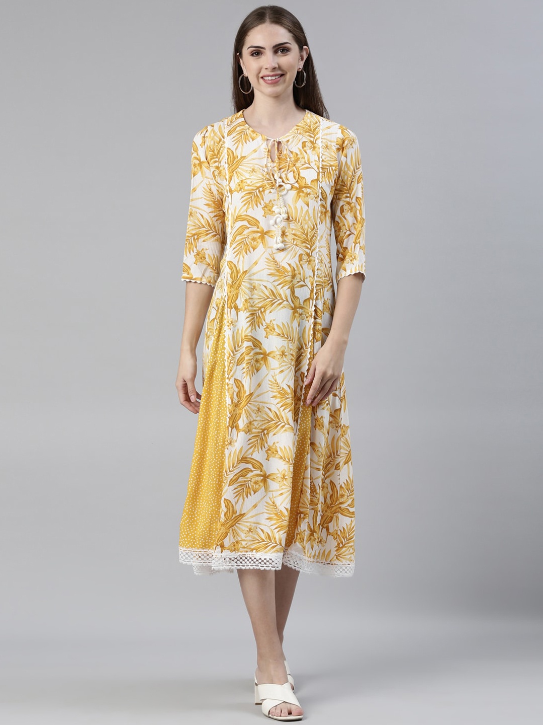 

Neerus Floral Printed Tie Up Neck A-Line Ethnic Dresses, Mustard