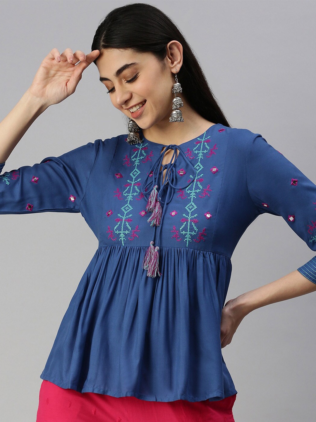 

MALHAAR Ethnic Motif Embroidered Tie Up Neck Peplum Top, Blue
