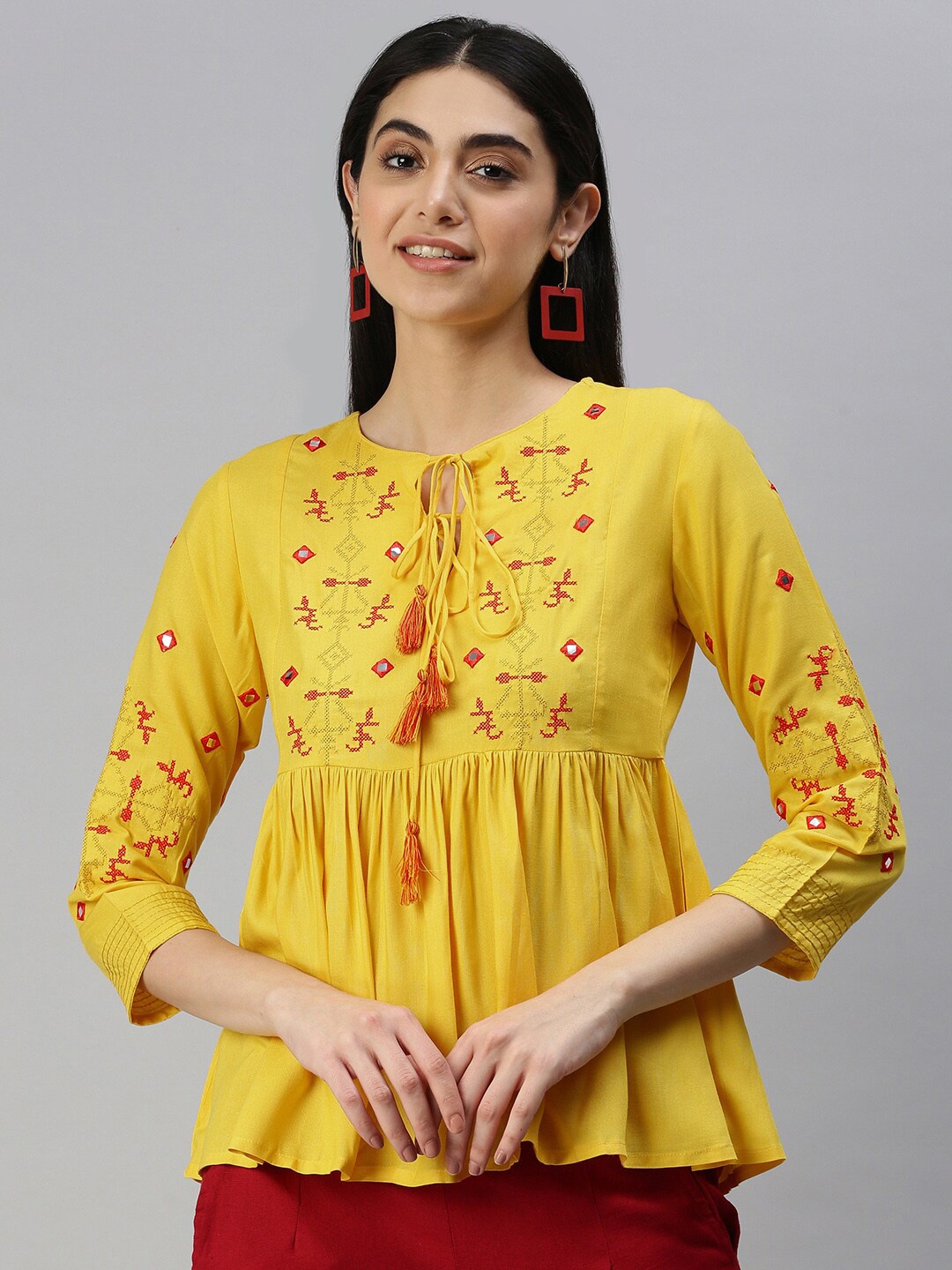 

MALHAAR Ethnic Motifs Embroidered Keyhole Neck Empire Top, Yellow