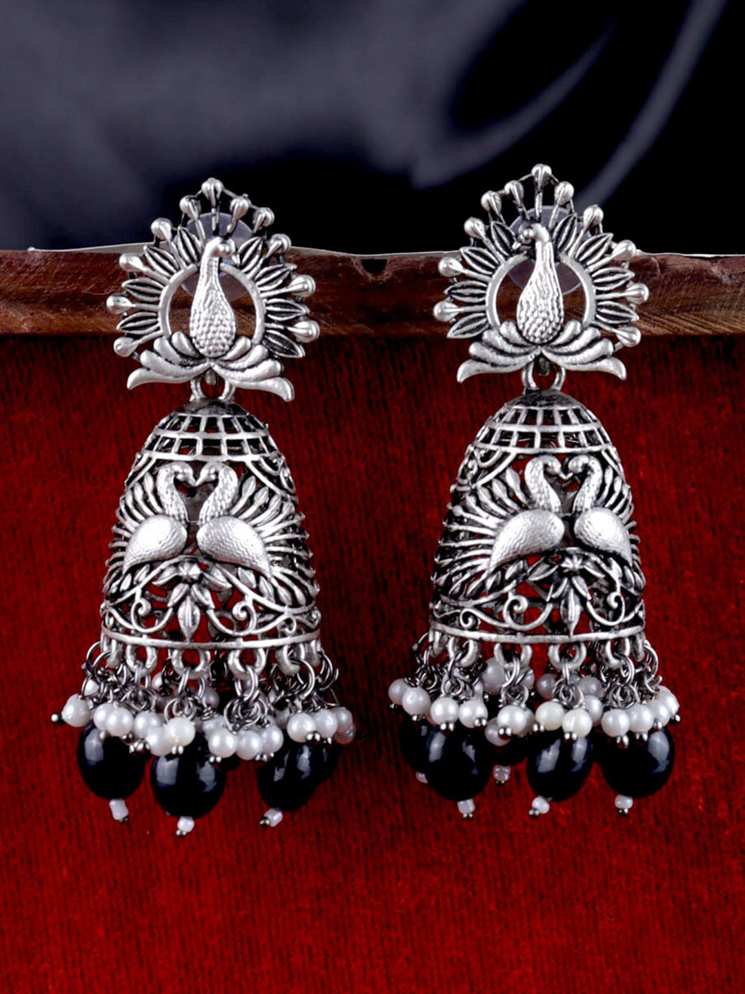 

Krelin Silver-Plated Beaded Oxidised Peacock Shaped Jhumkas Earrings, Black