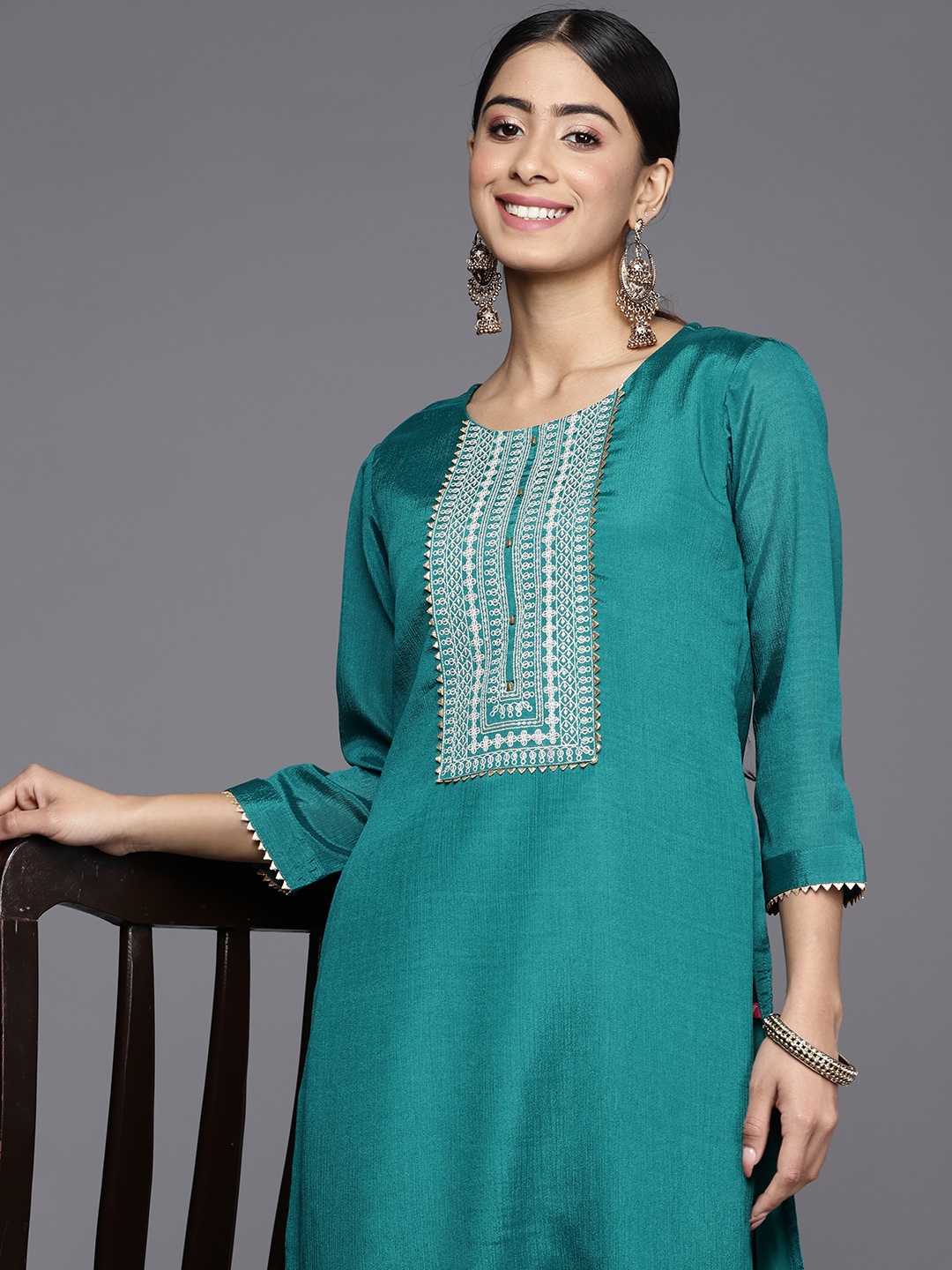 

Varanga Women Teal & Off White Yoke Design Kurta