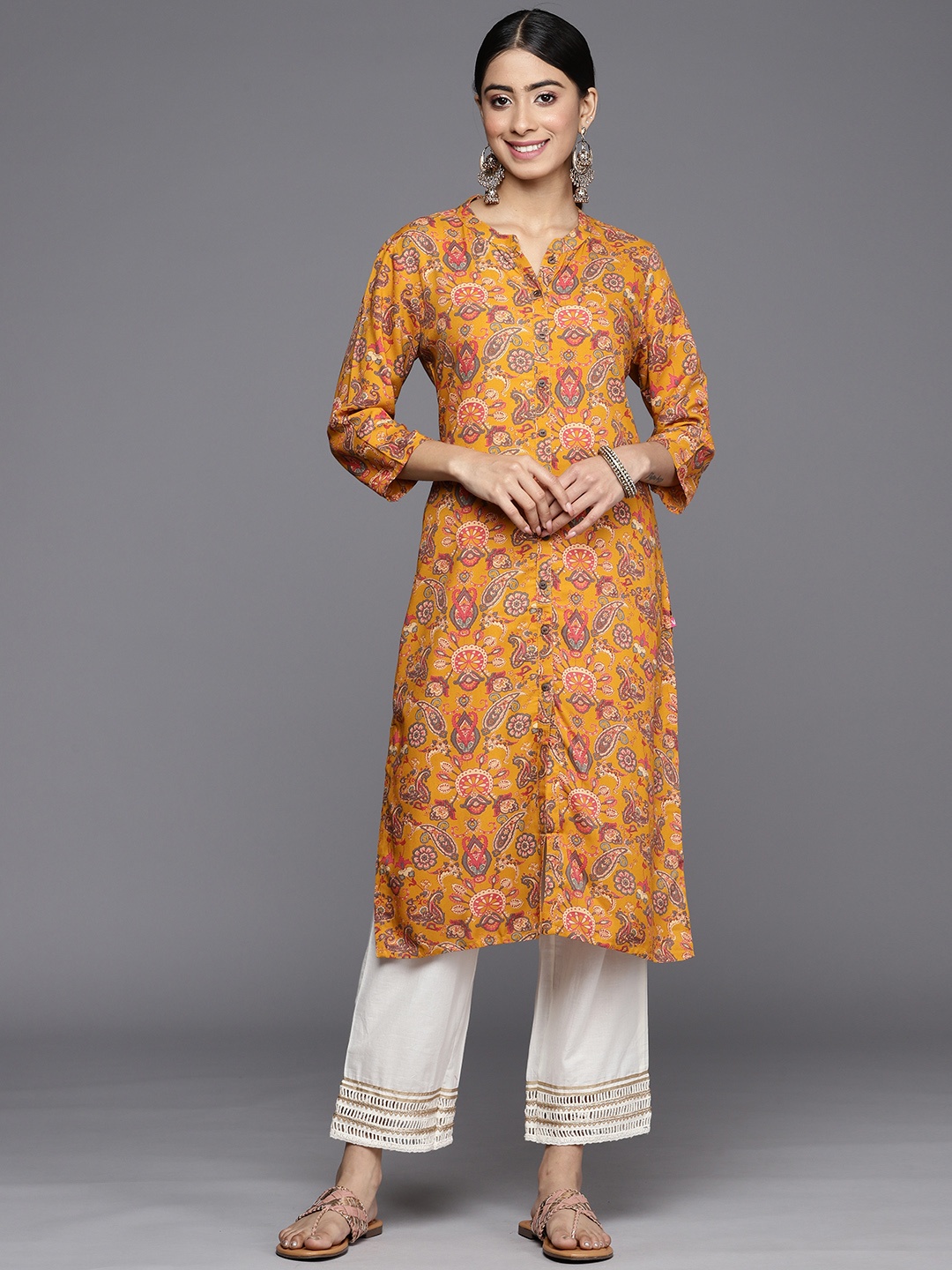 

Varanga Women Mustard Yellow & Grey Ethnic Motifs Printed Kurta