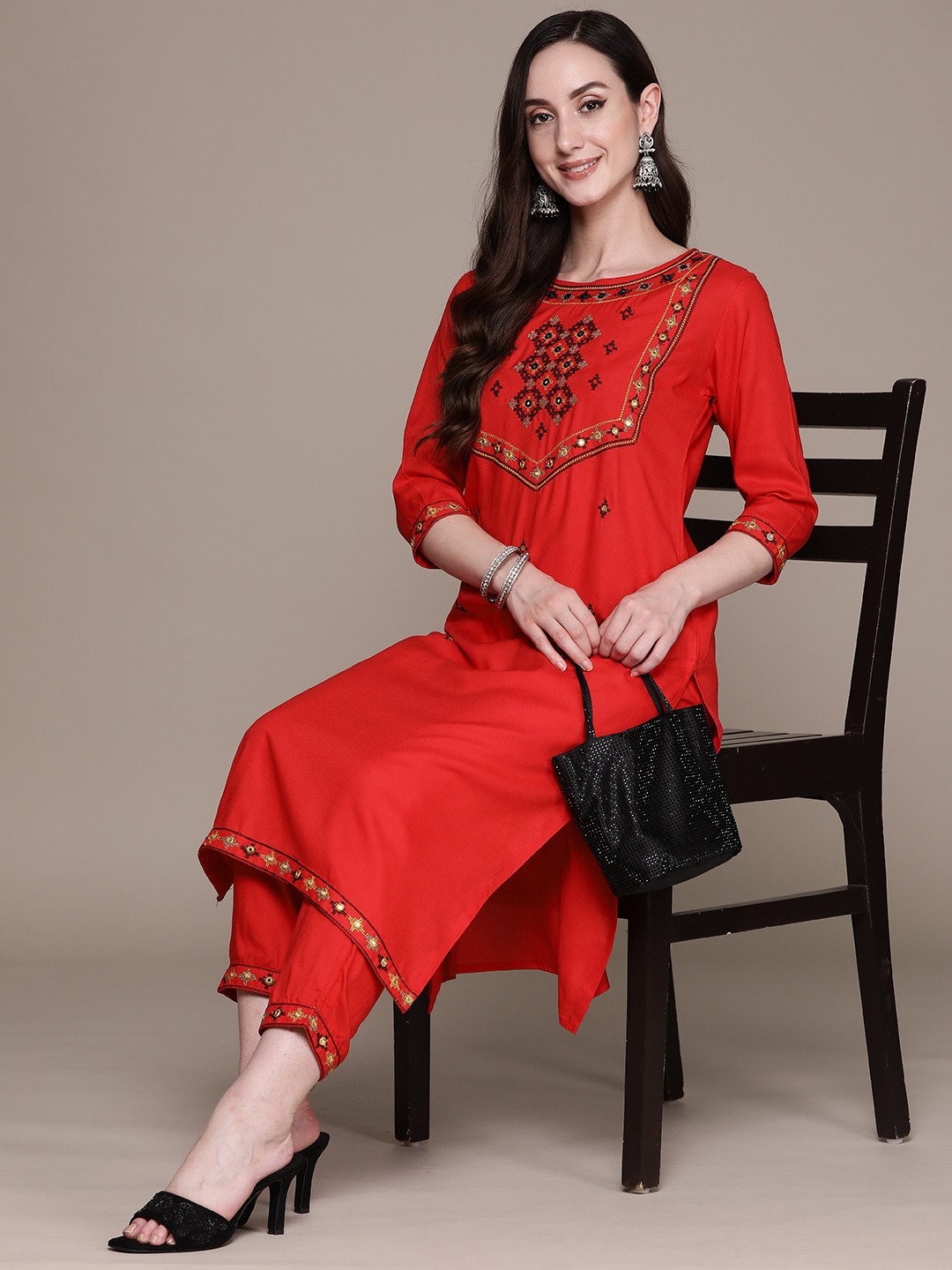 

Anubhutee Ethnic Motifs Yoke Design Regular Mirror Work Kurta with Trousers, Red